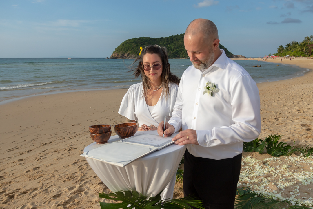 sign wedding certificate beach