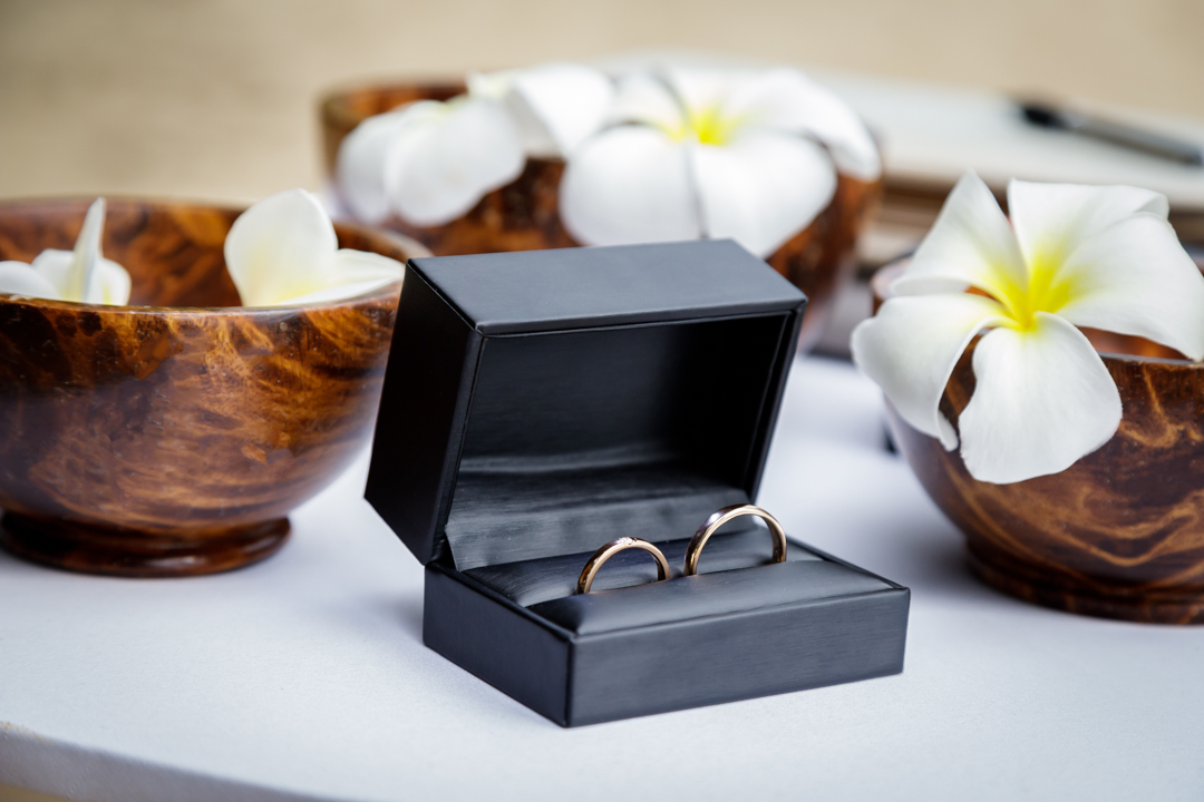 wedding rings frangipani flowers