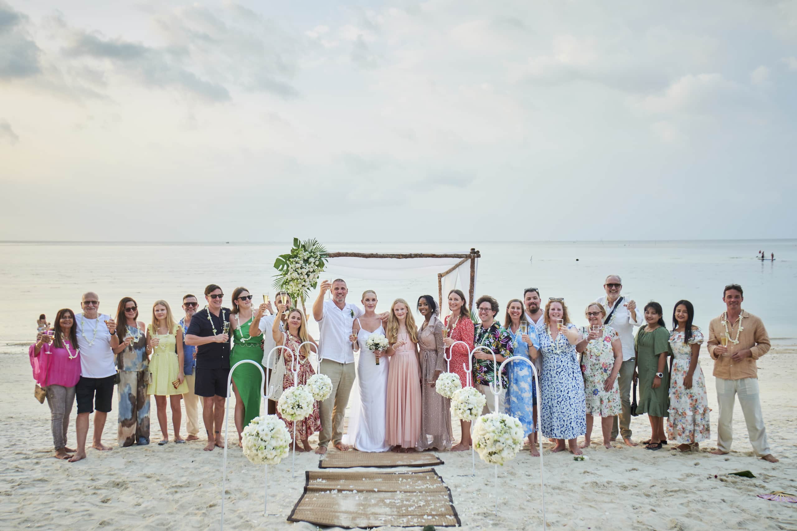 beach wedding guests group picture