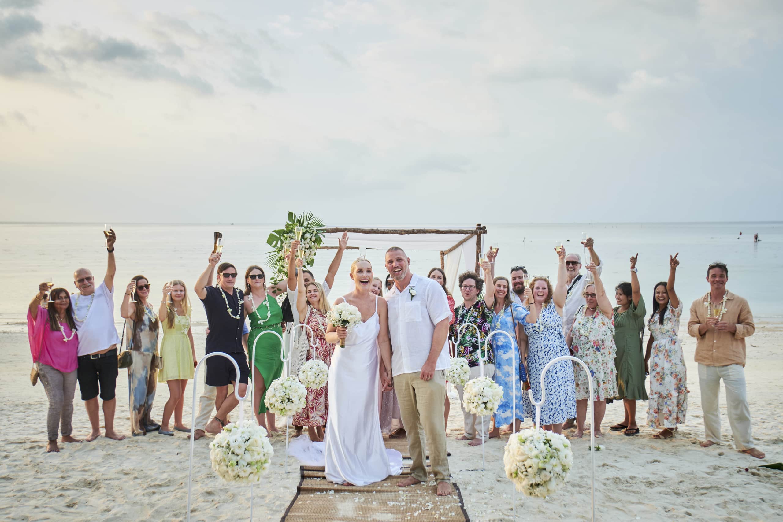 beach wedding guests group picture