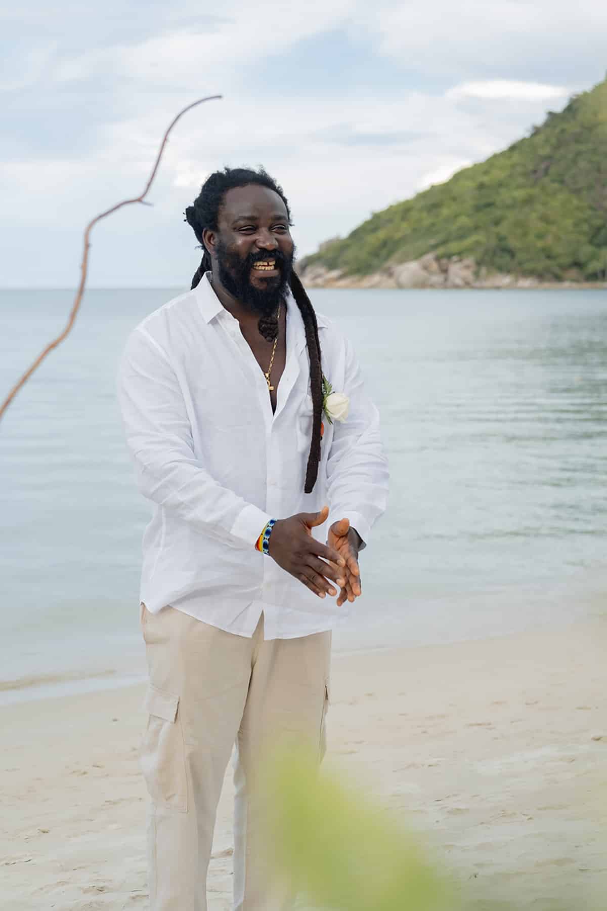 beach wedding ceremony groom