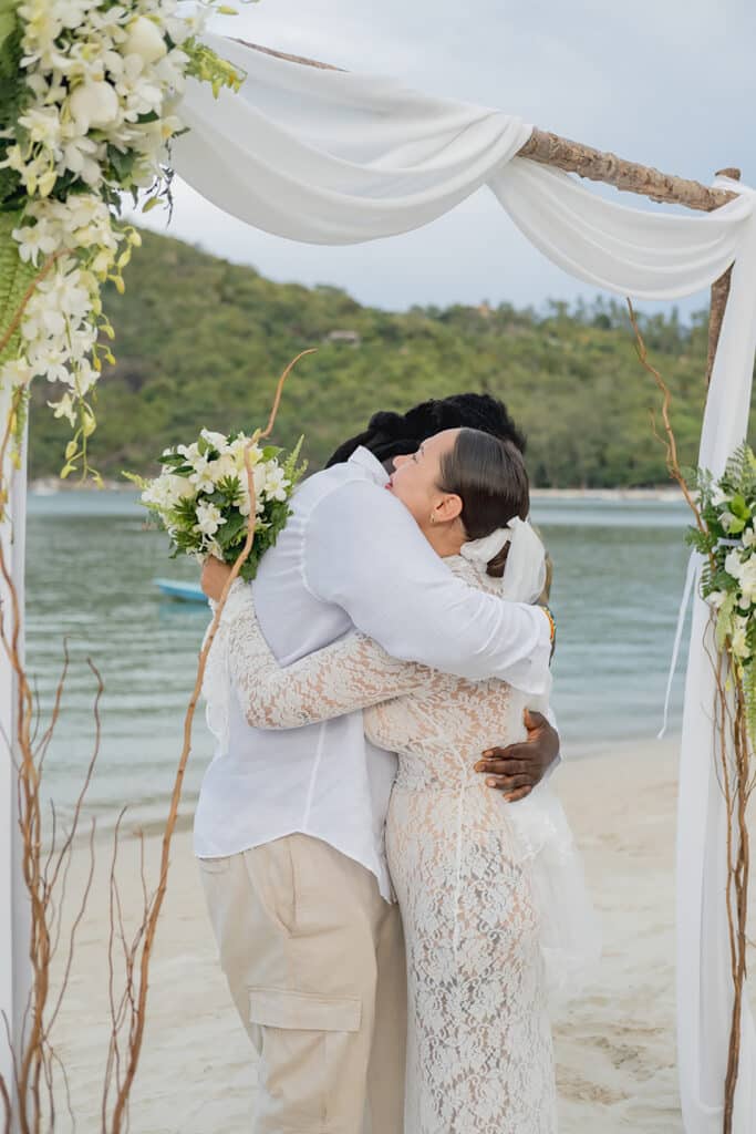 beach wedding ceremony couple