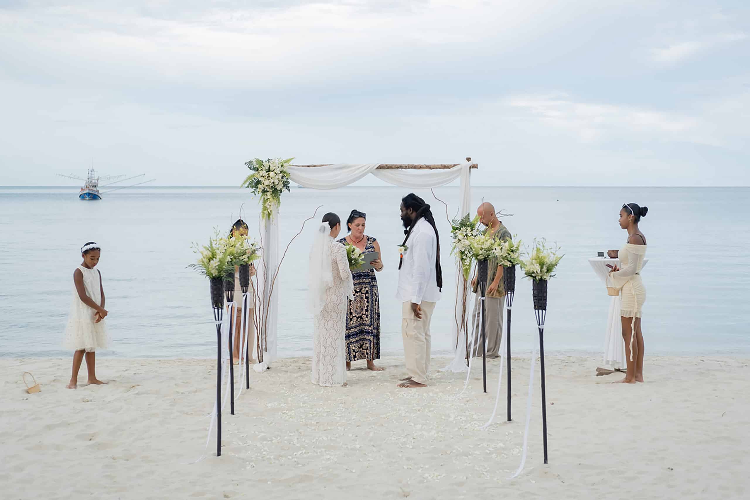 beach wedding ceremony couple