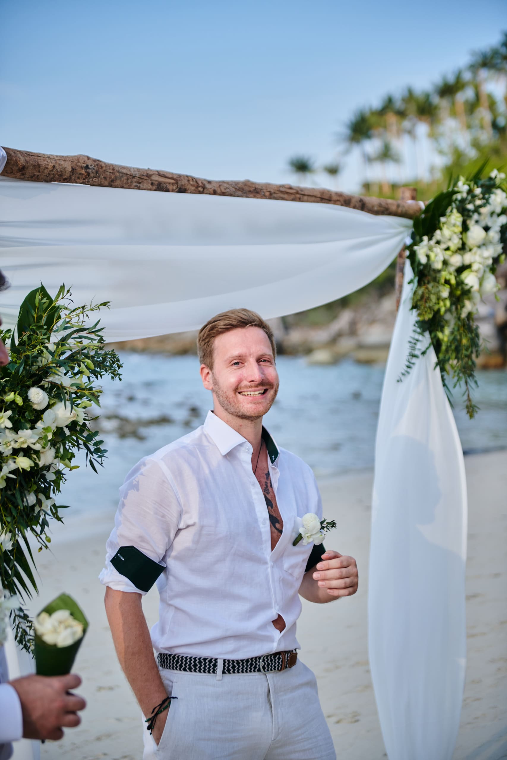 beach wedding ceremony groom