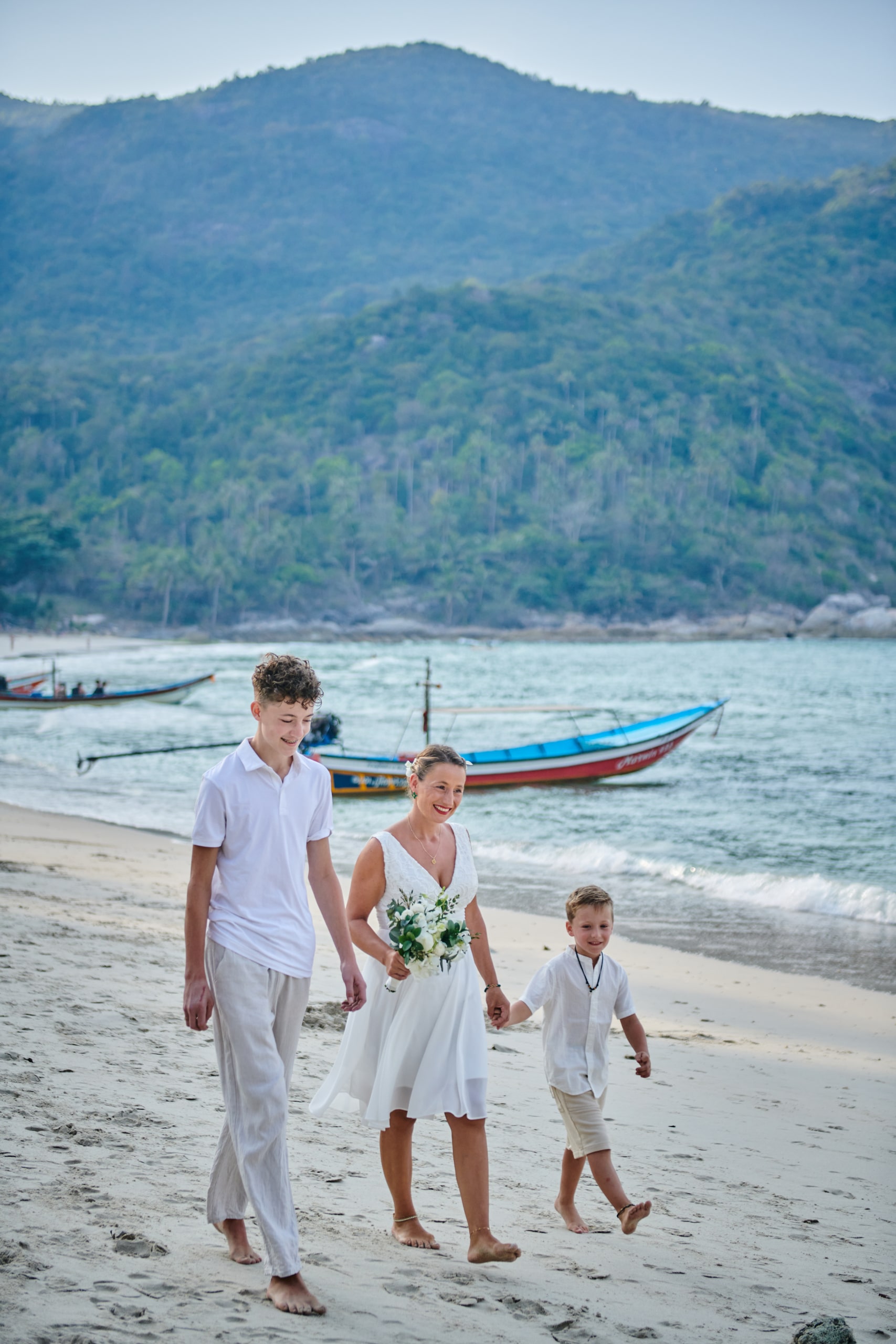 beach wedding ceremony bride and kids
