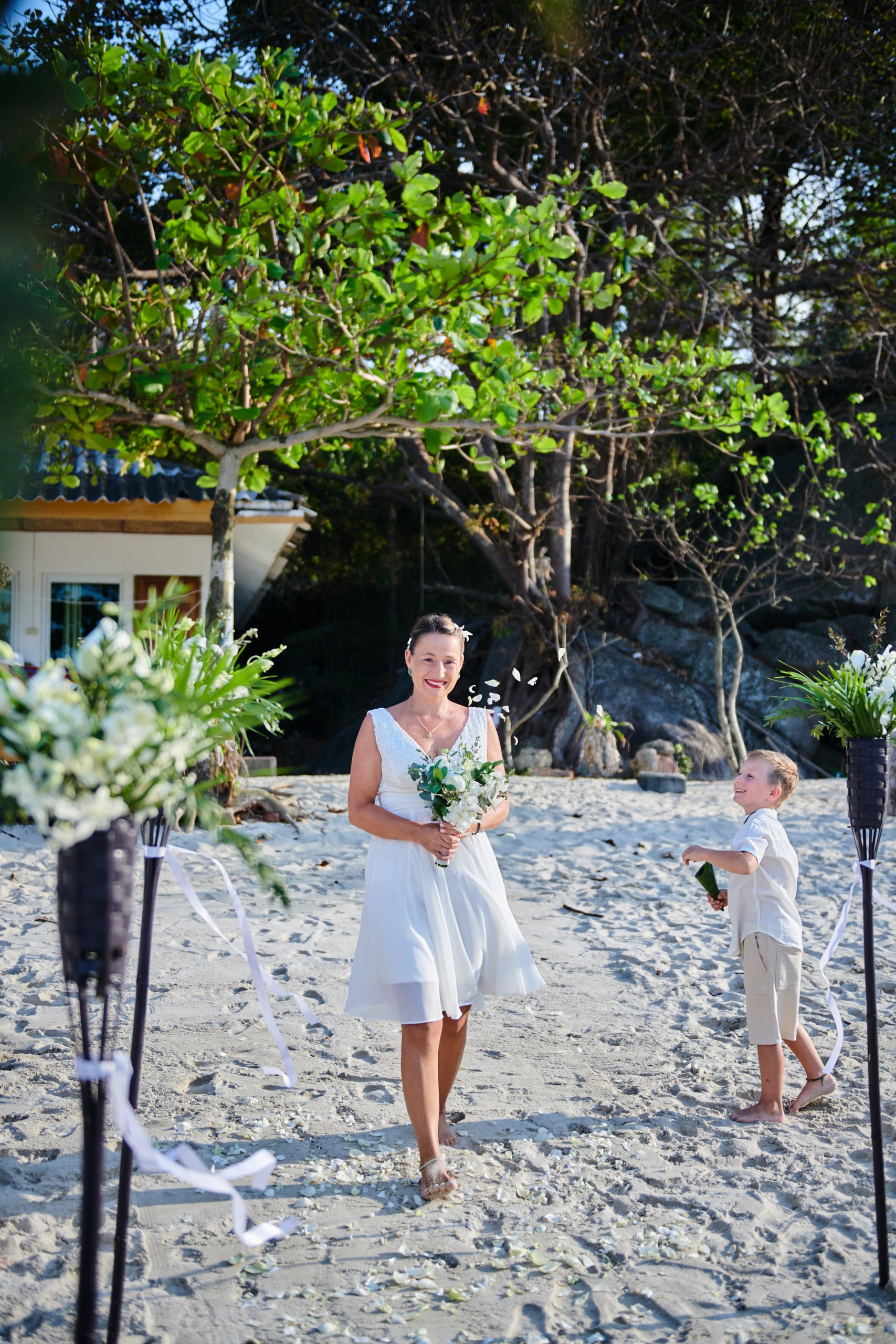 beach wedding ceremony bride