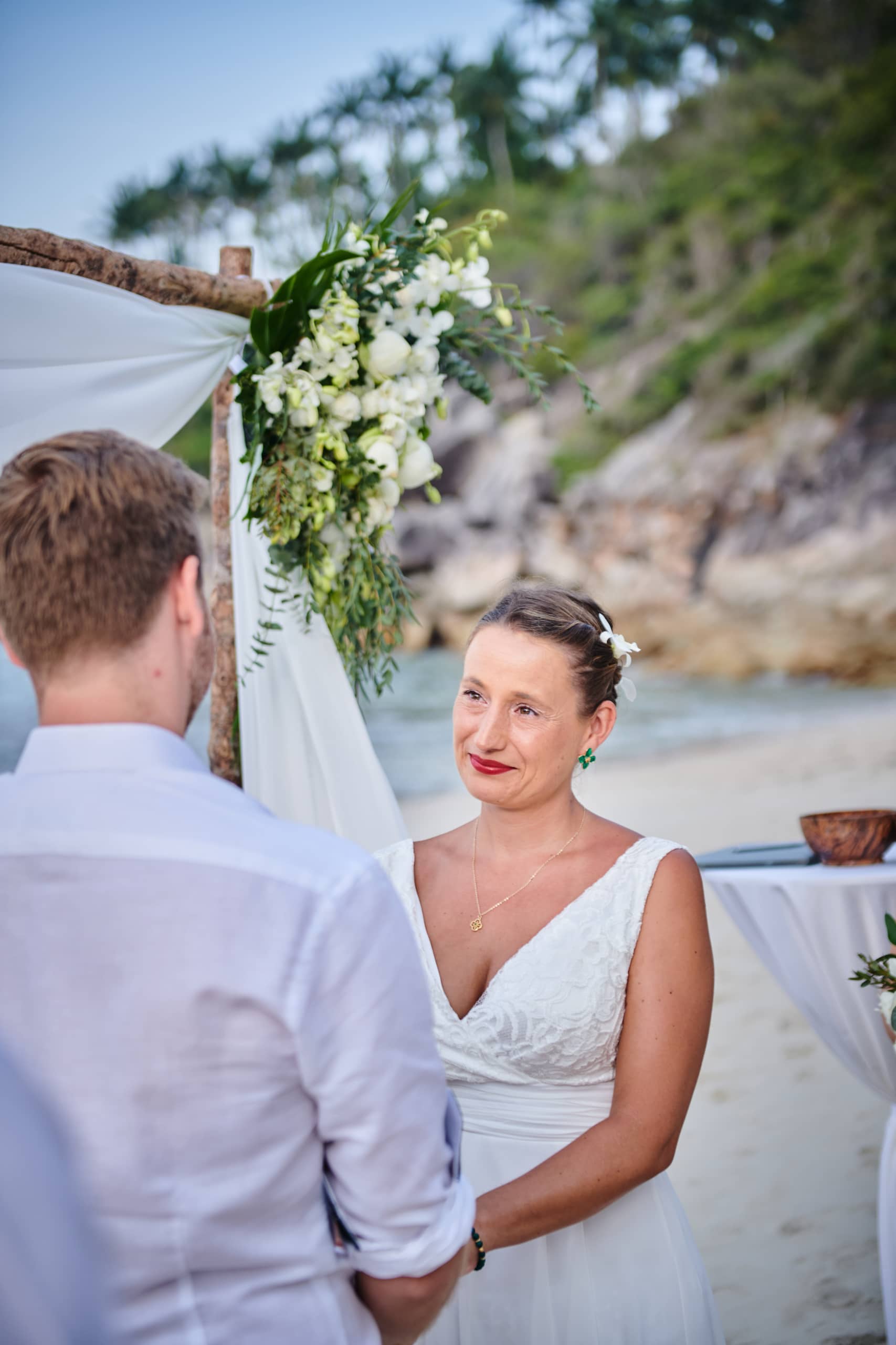 beach wedding ceremony bride