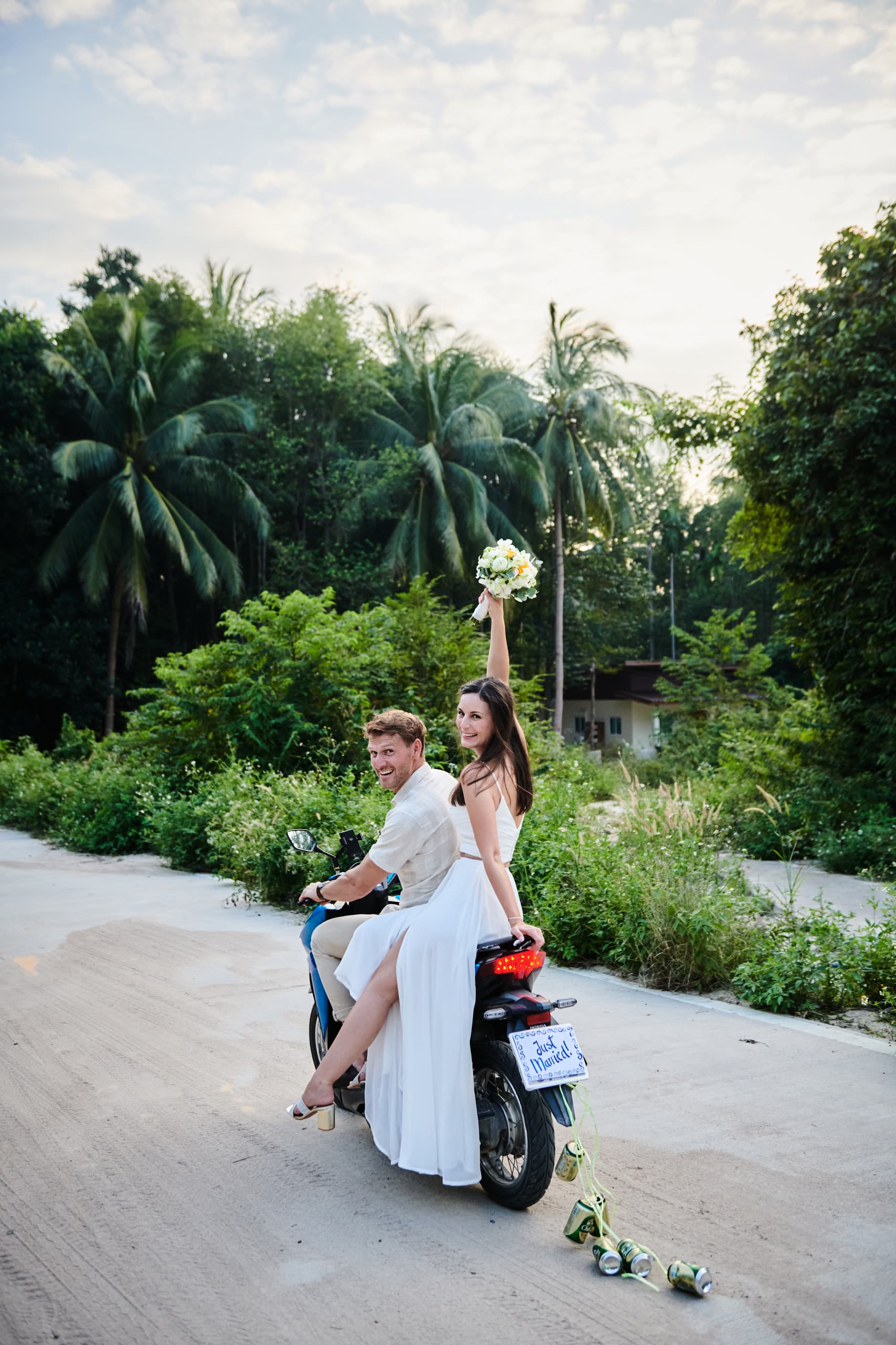 tropical wedding couple motorbike