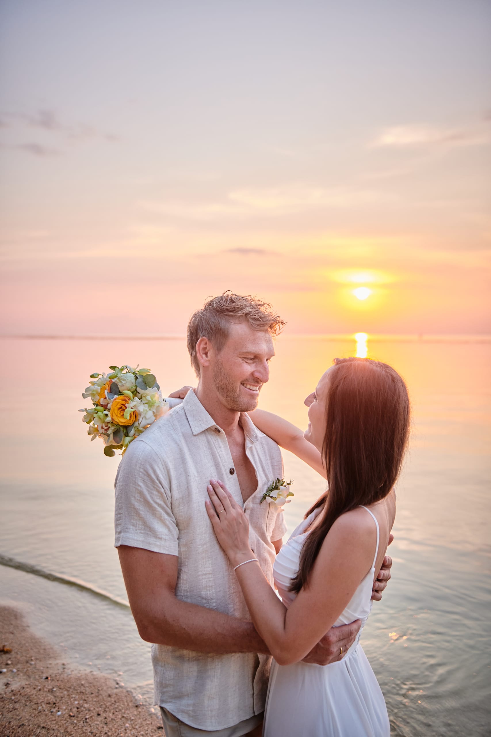 beach wedding sunset couple shooting