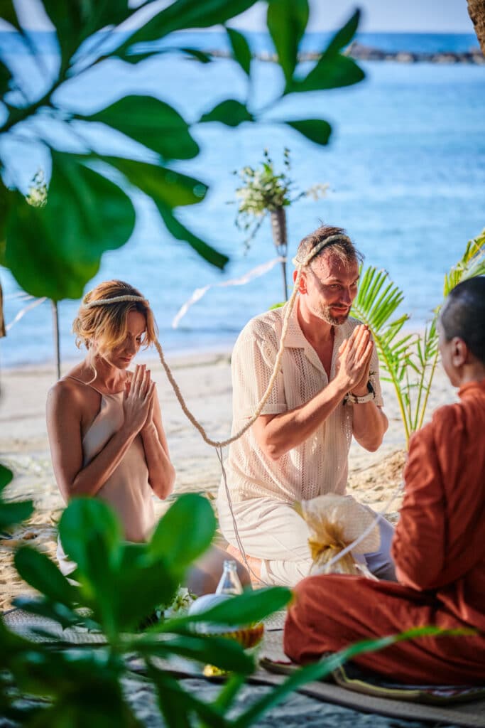 beach wedding monk blessing