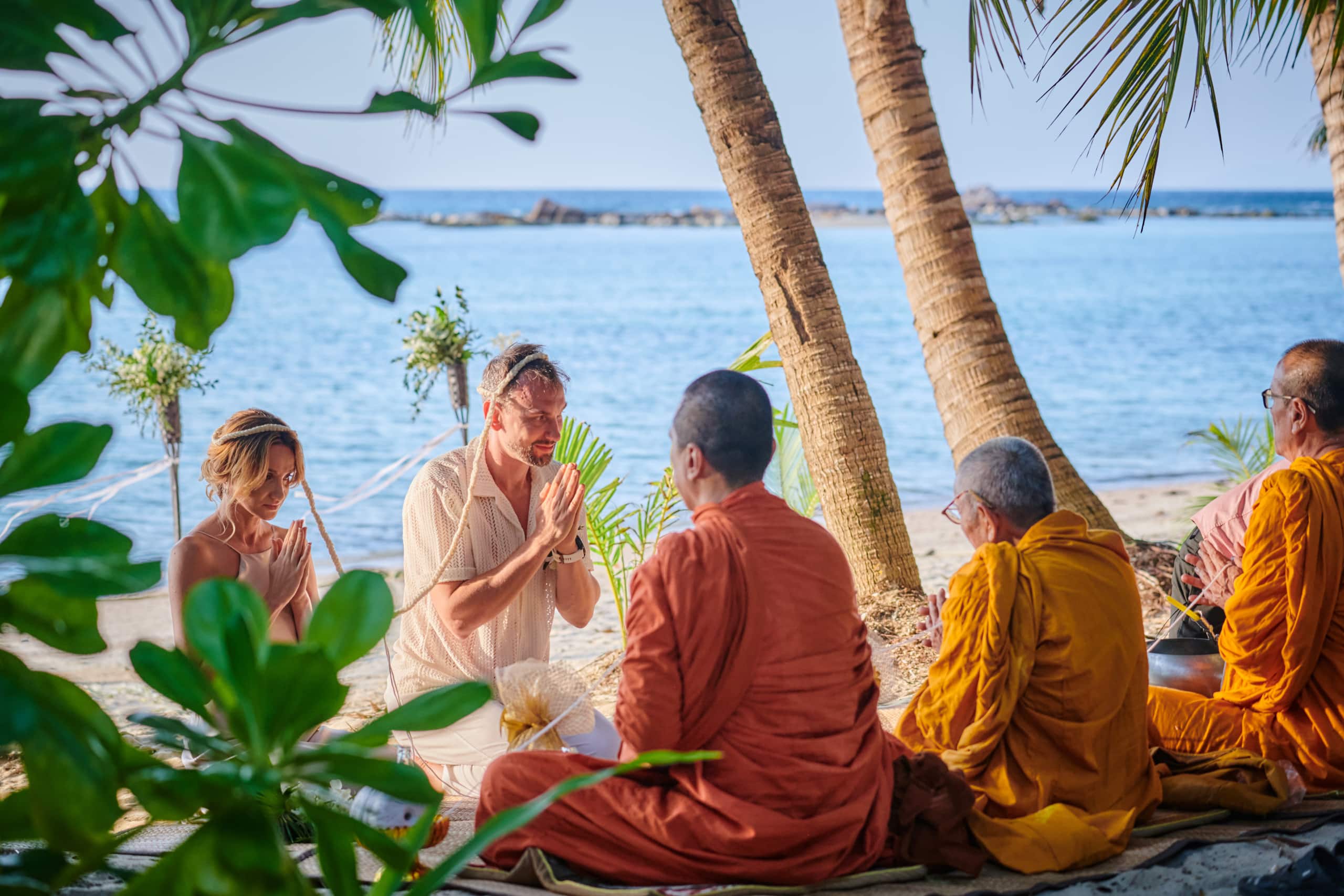 beach wedding monk blessing