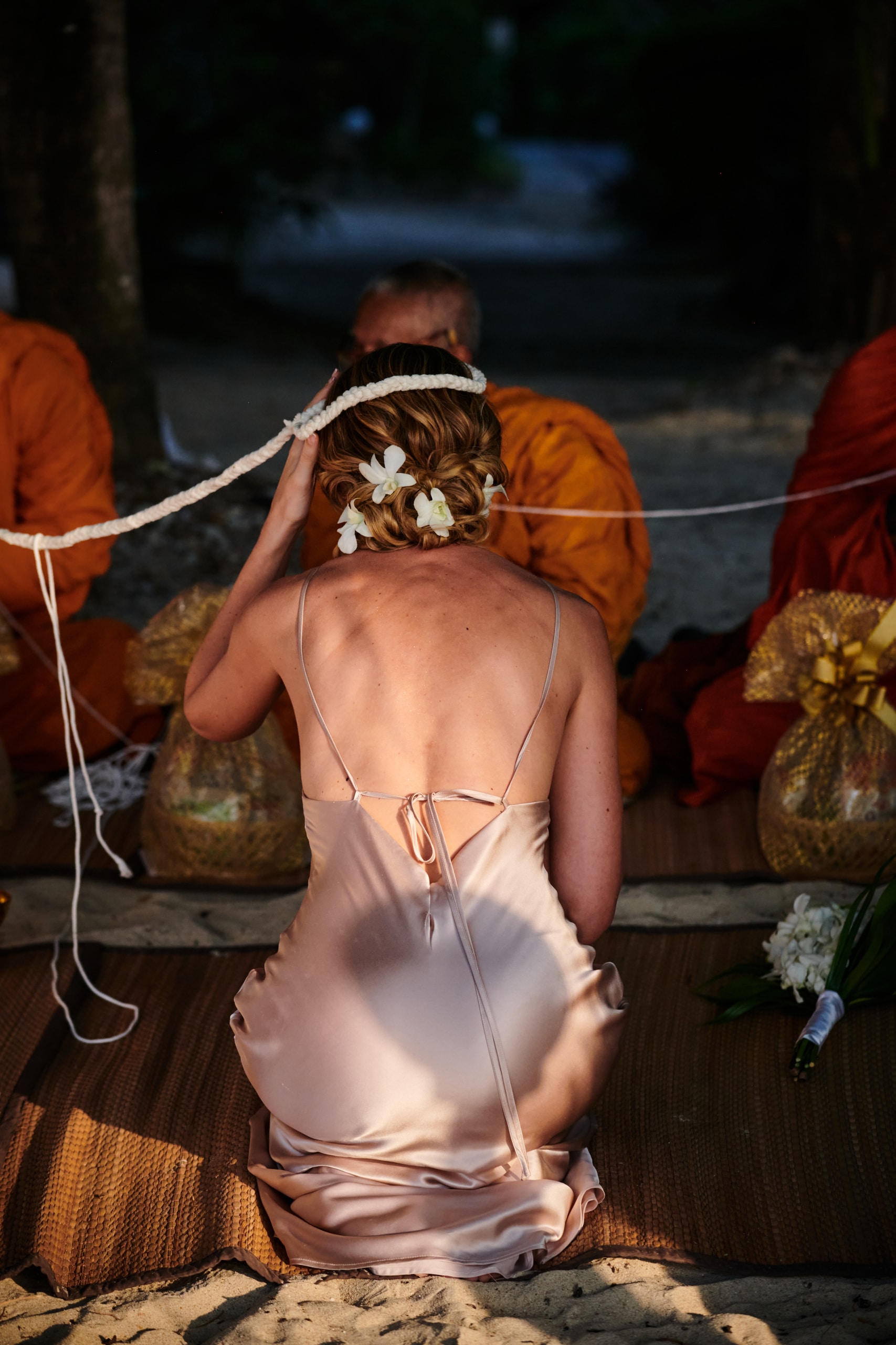 beach wedding monk blessing bride