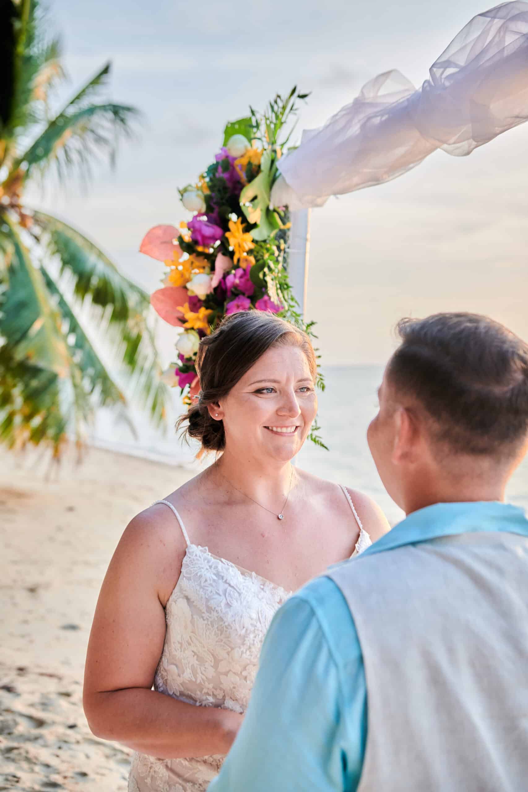 beach wedding ceremony couple