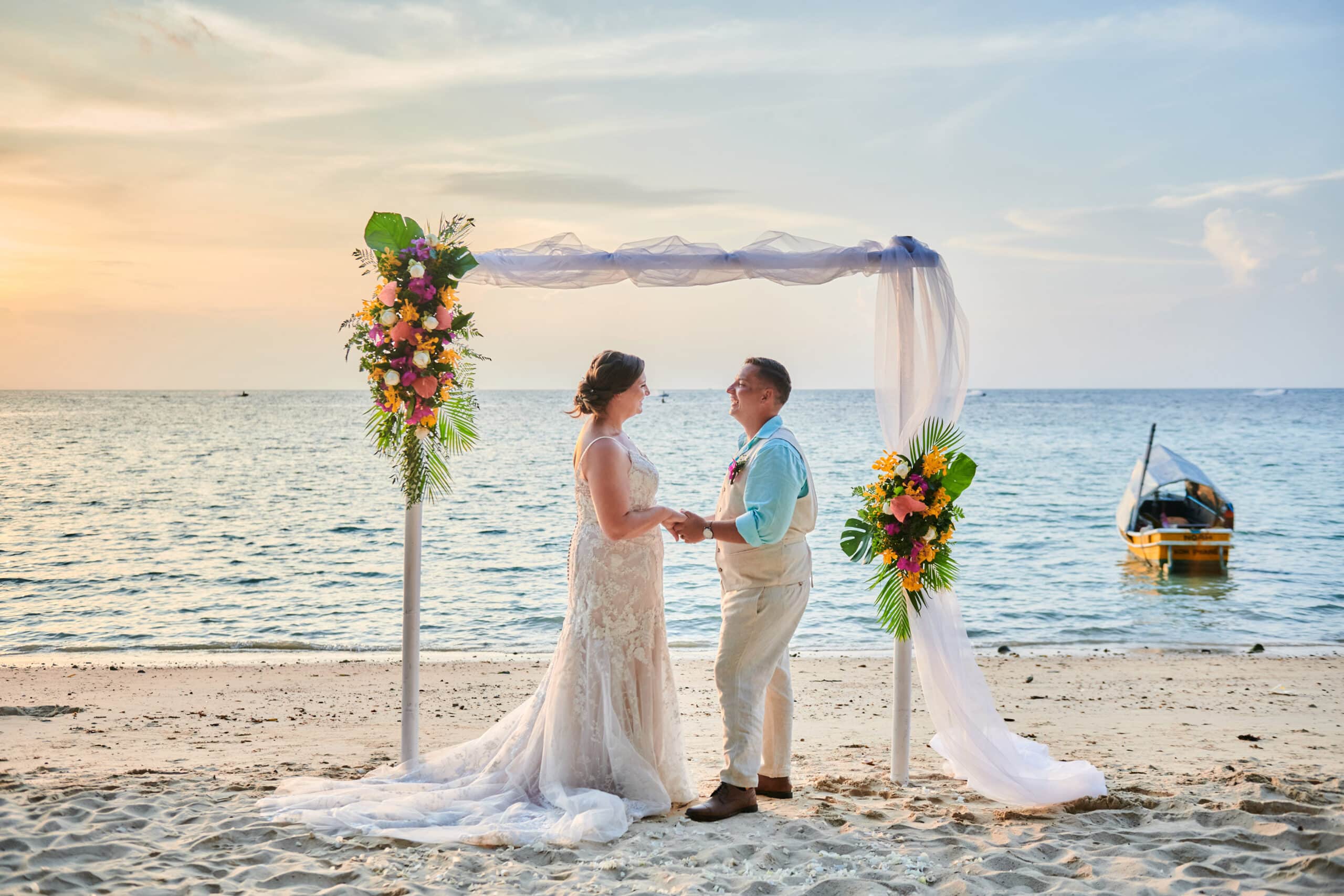 beach wedding ceremony couple