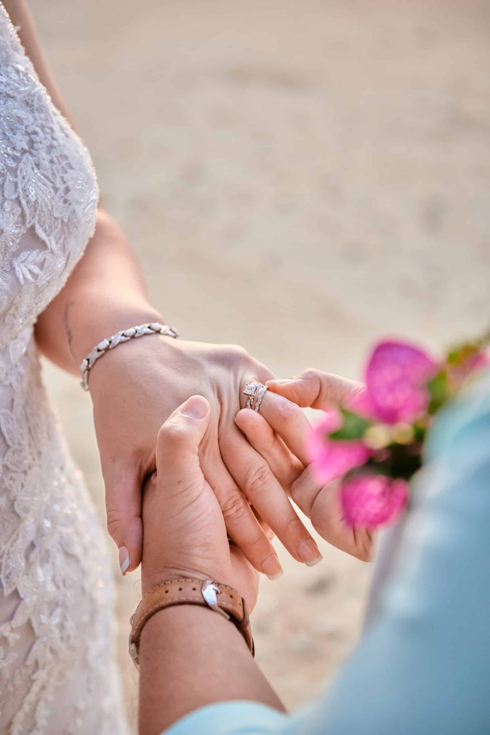 beach wedding couple rings