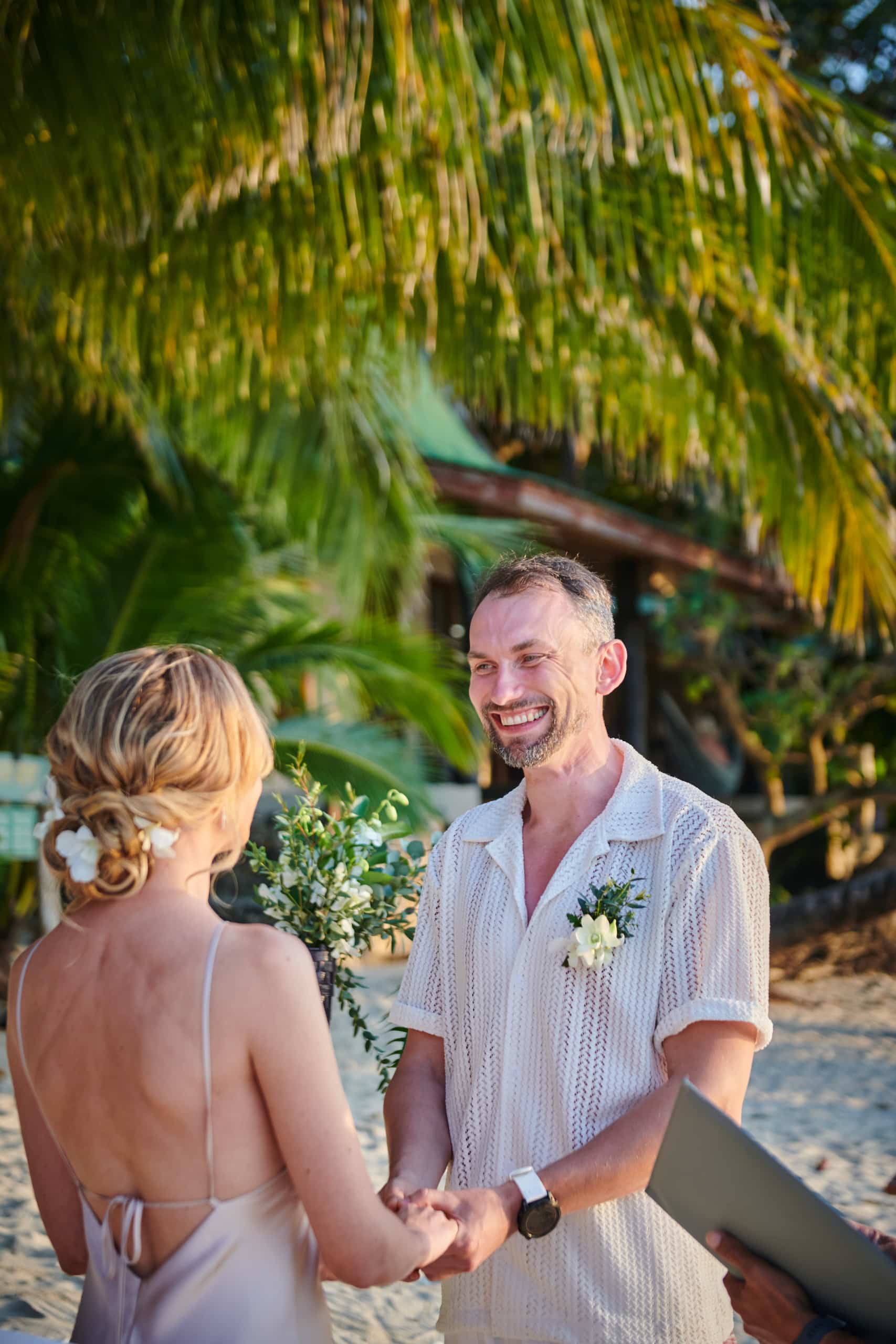beach wedding ceremony couple