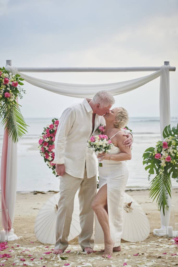 beach wedding ceremony couple