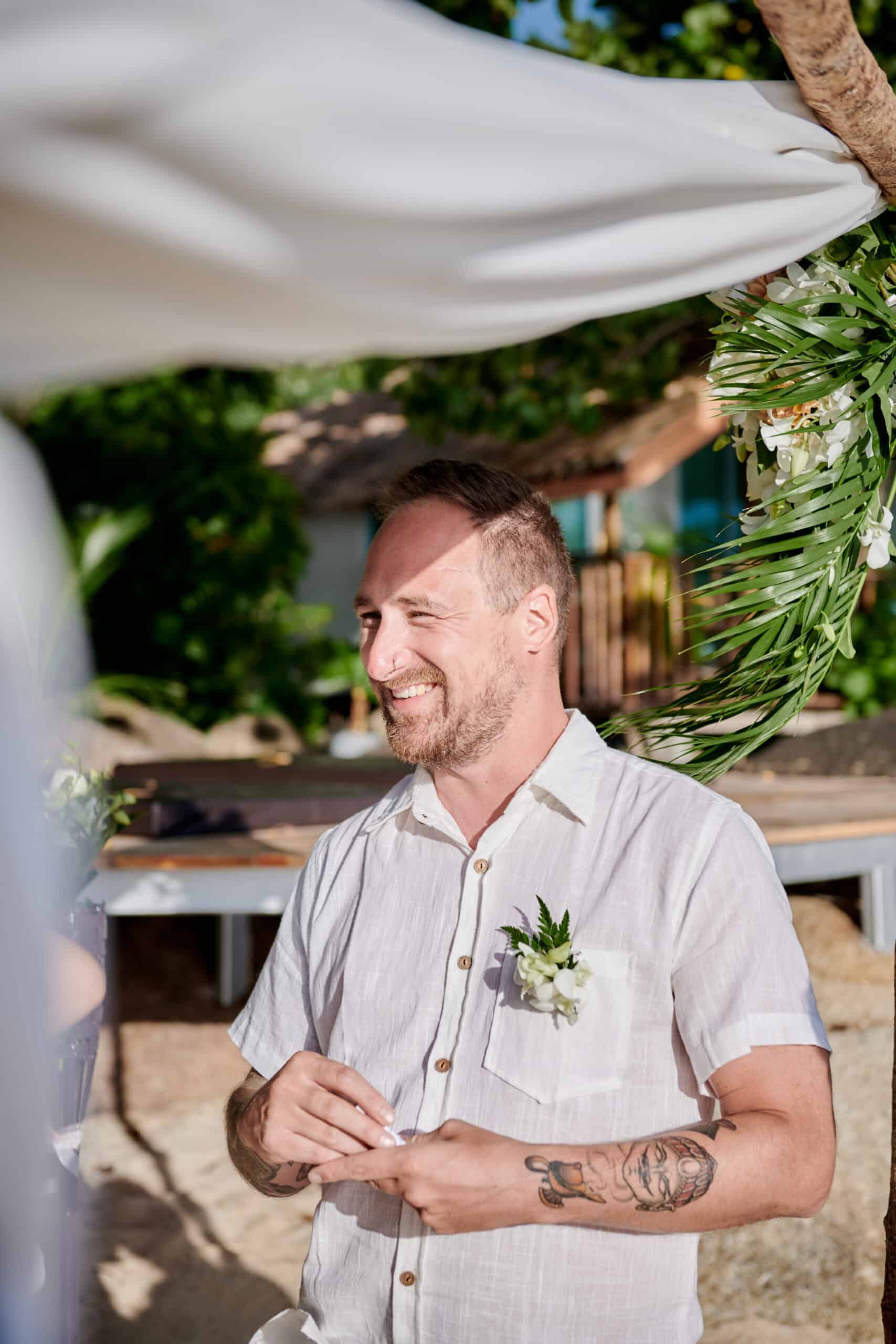 beach wedding ceremony groom