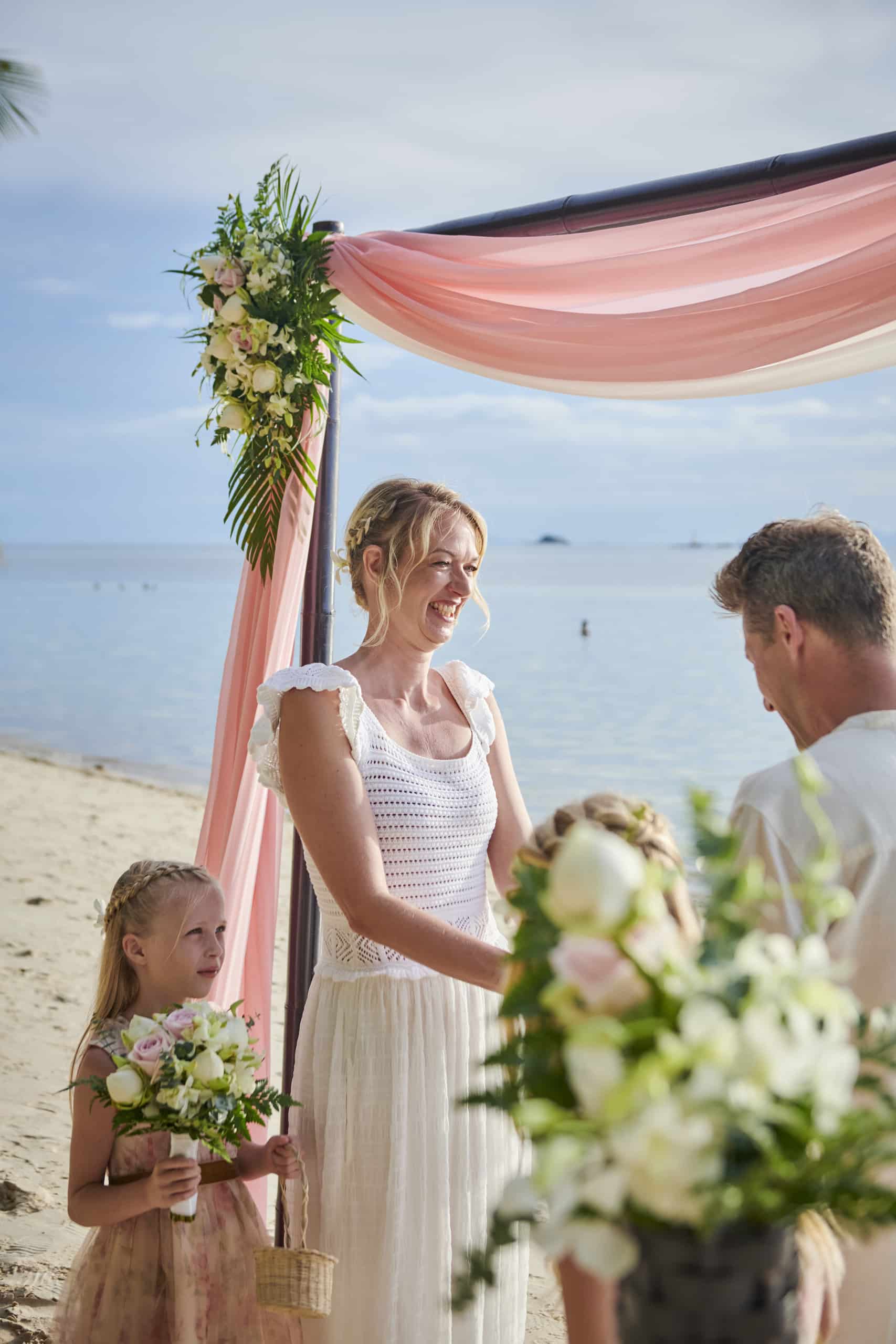 family beach wedding ceremony