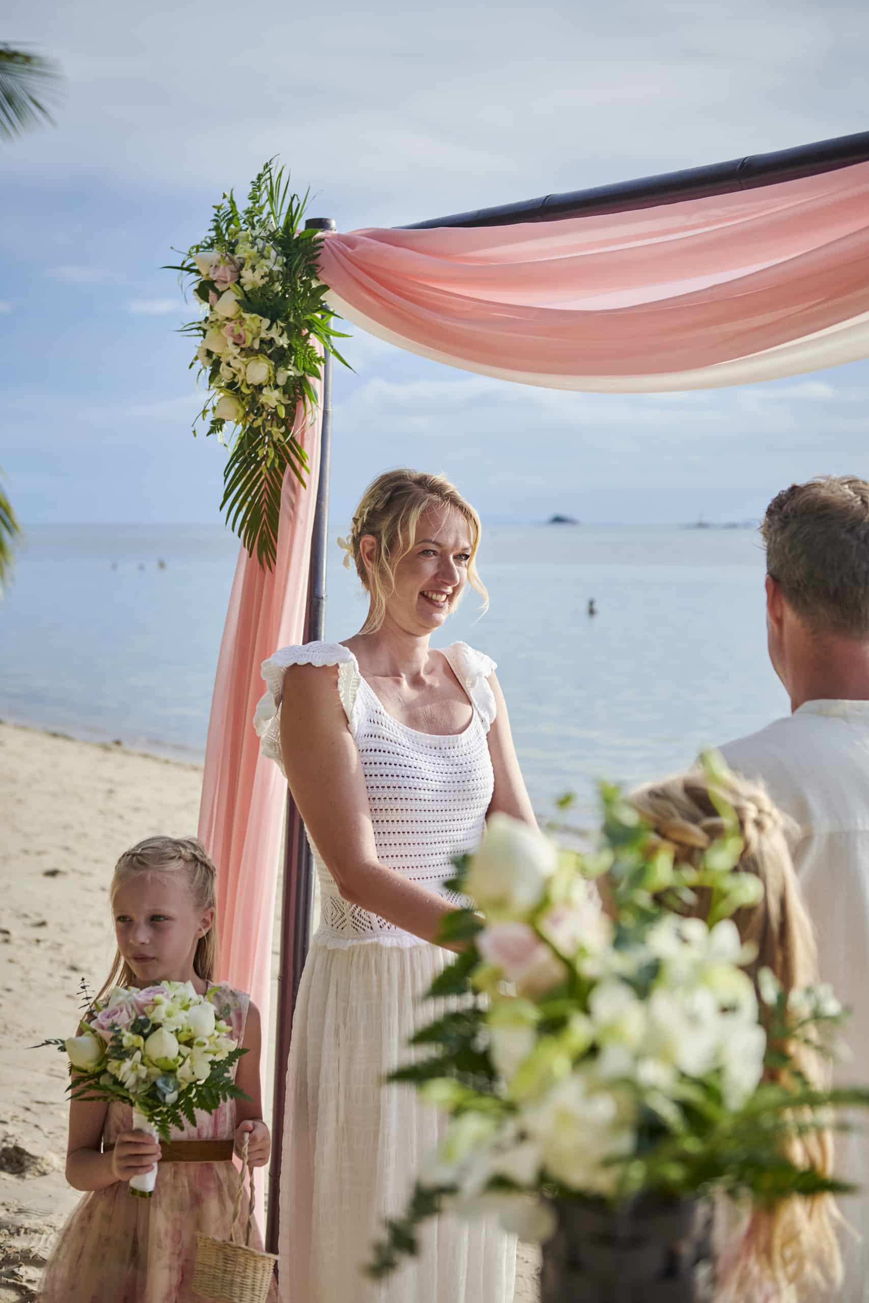 family beach wedding ceremony