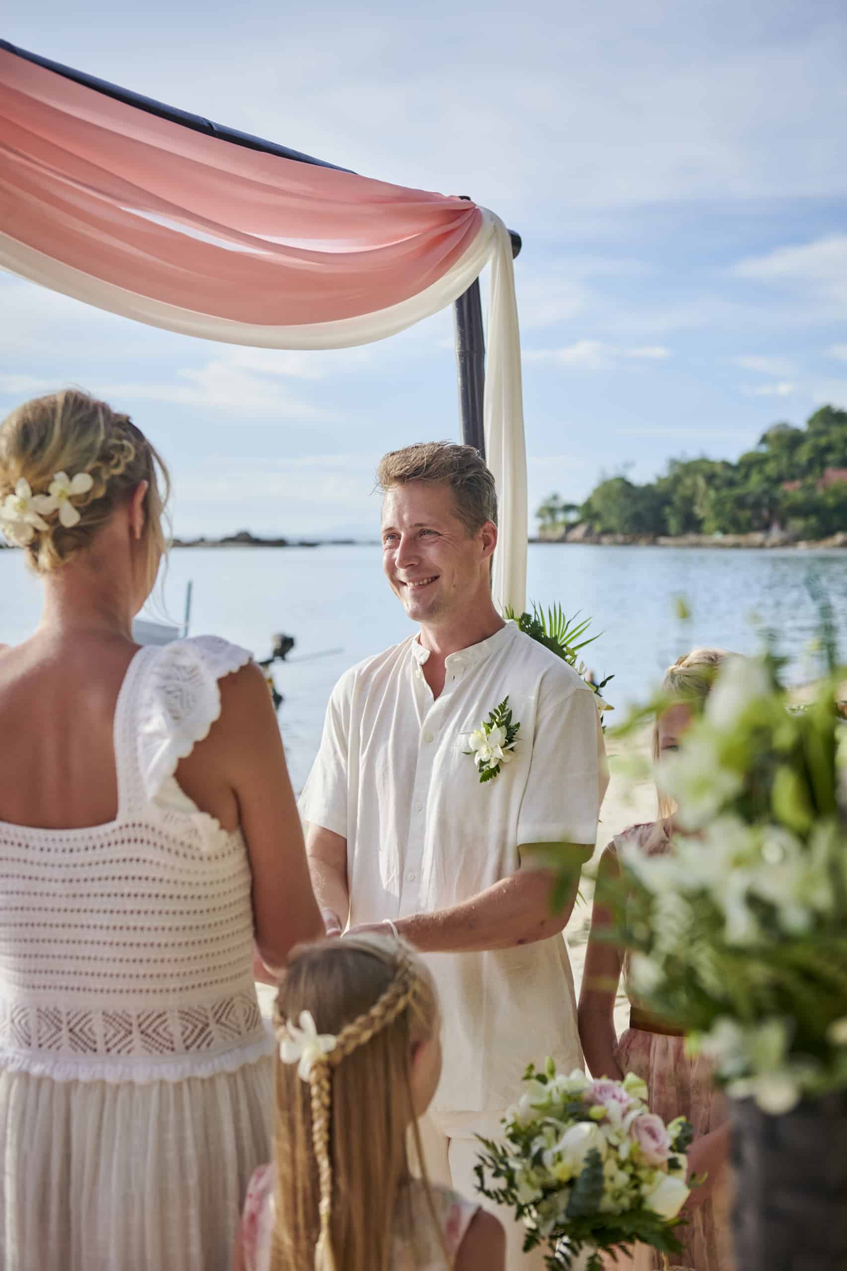 family beach wedding ceremony