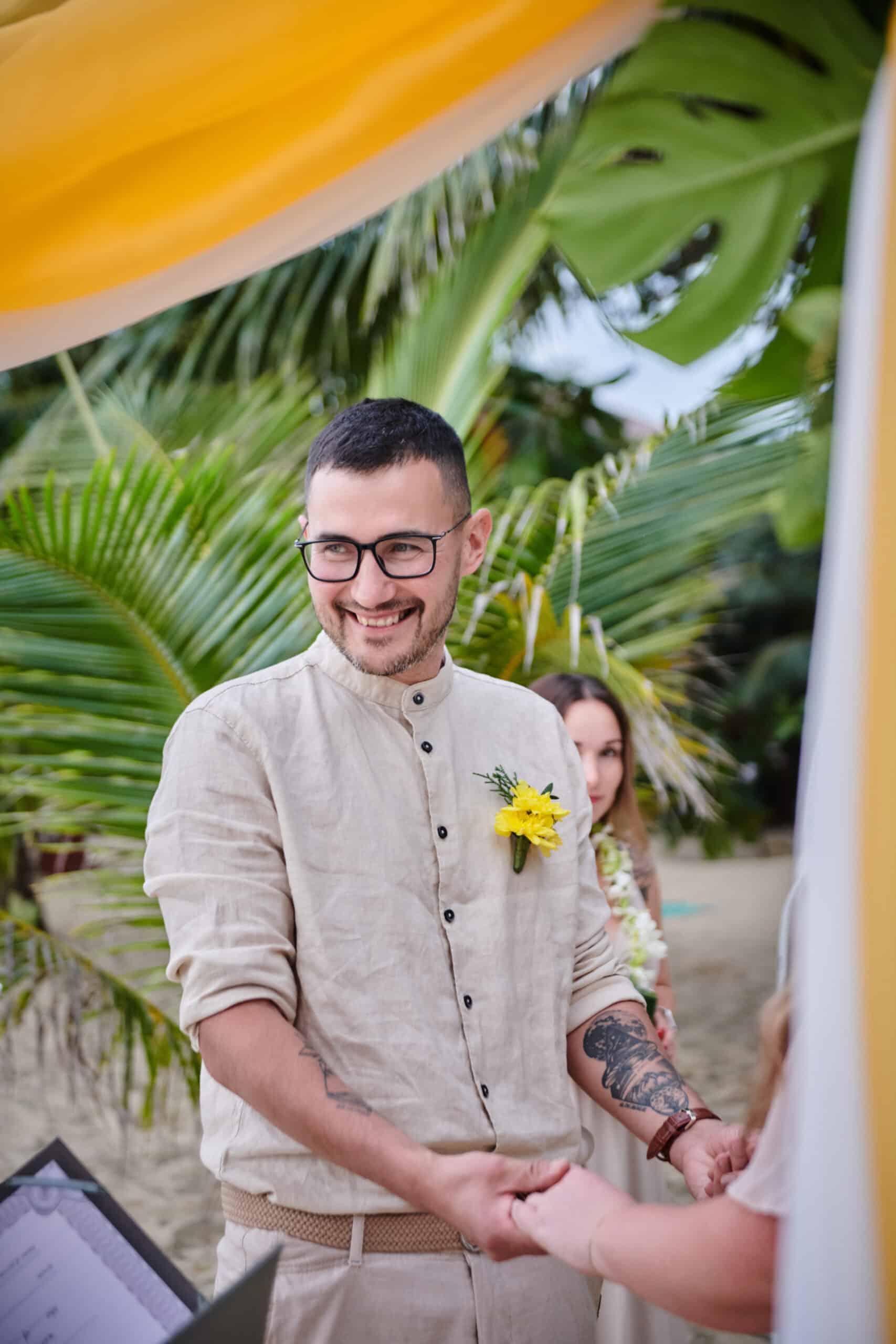 beach wedding ceremony groom