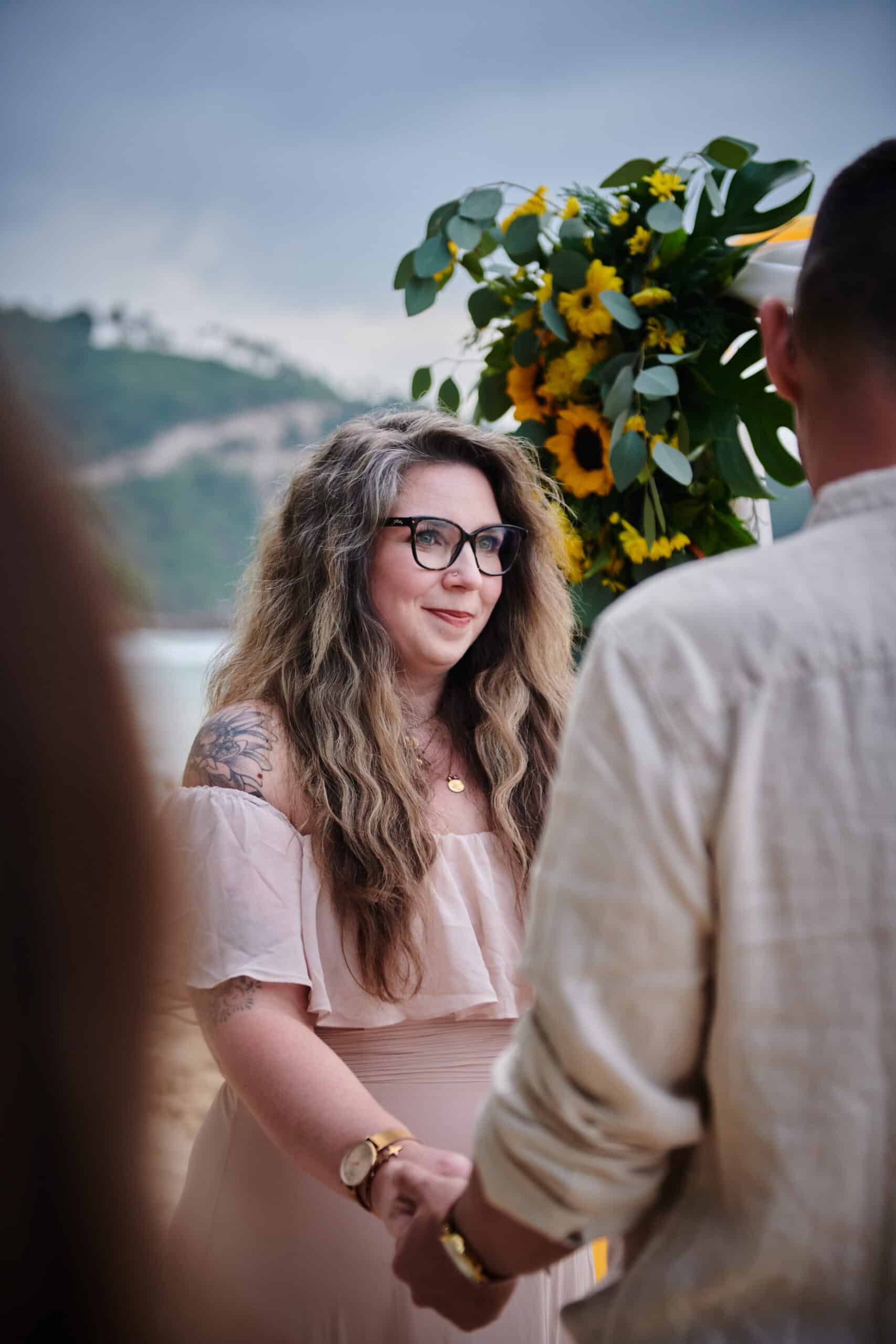 beach wedding ceremony bride