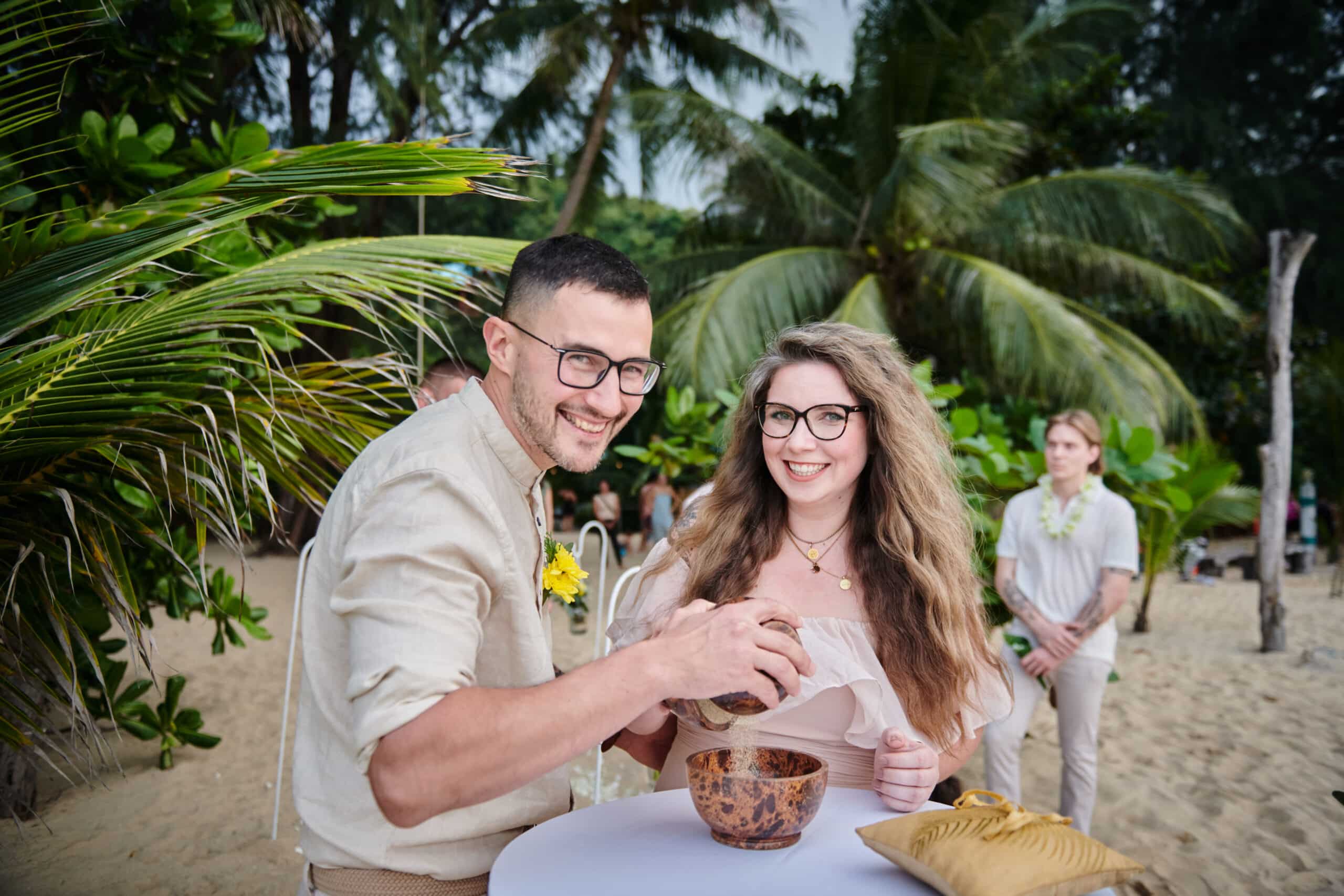 beach wedding ceremony couple