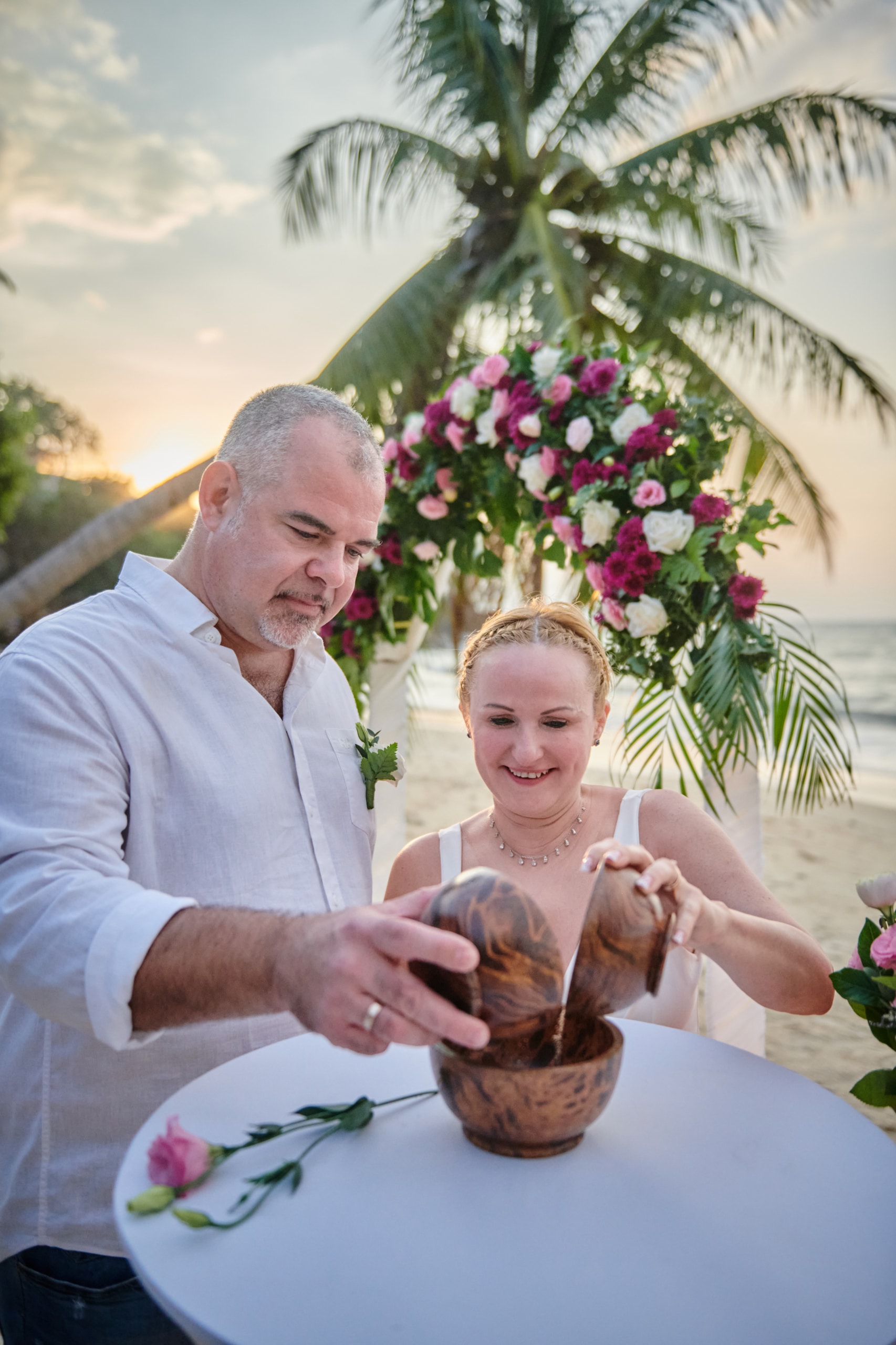 beach wedding ceremony couple