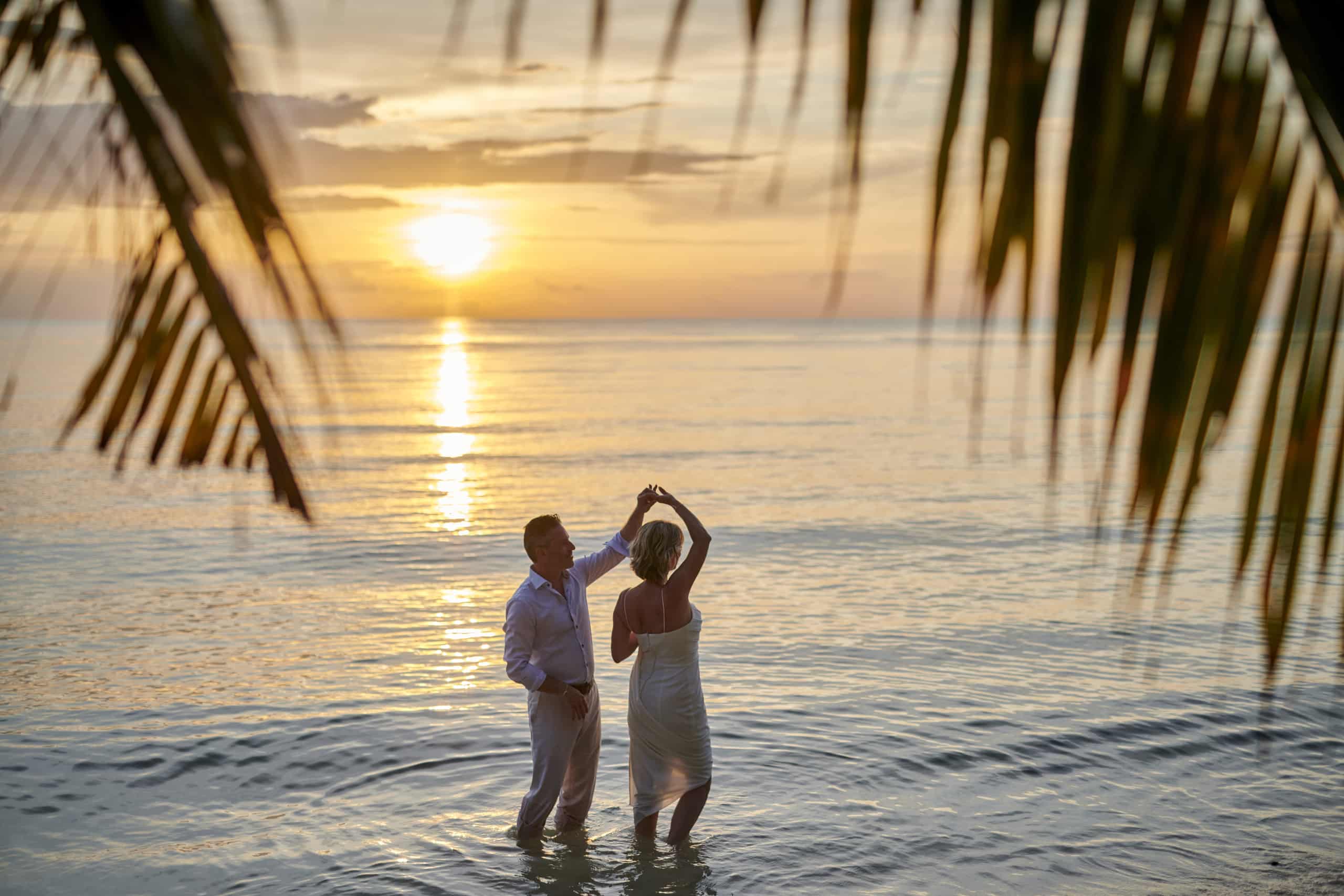 beach wedding couple sunset