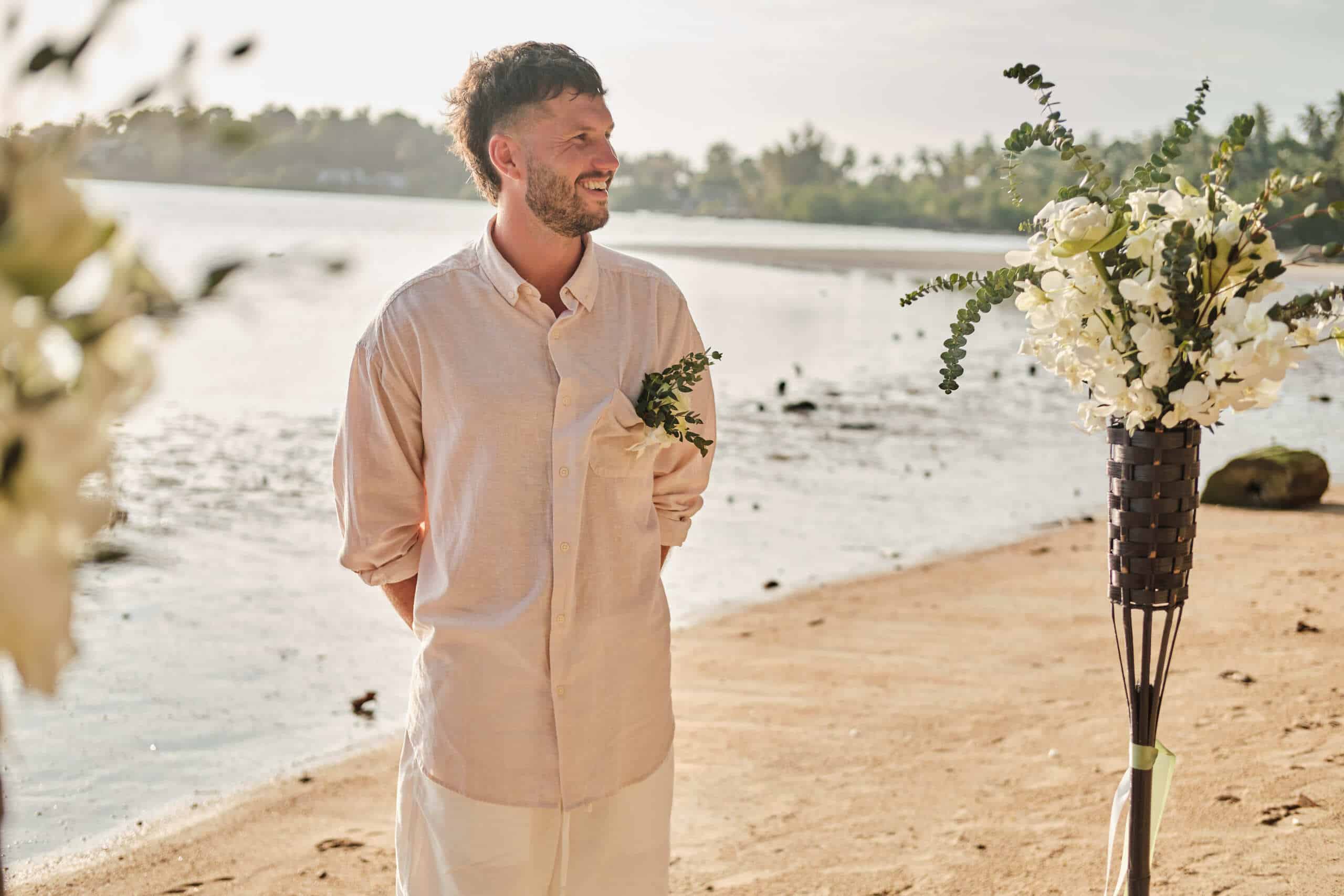beach wedding ceremony groom