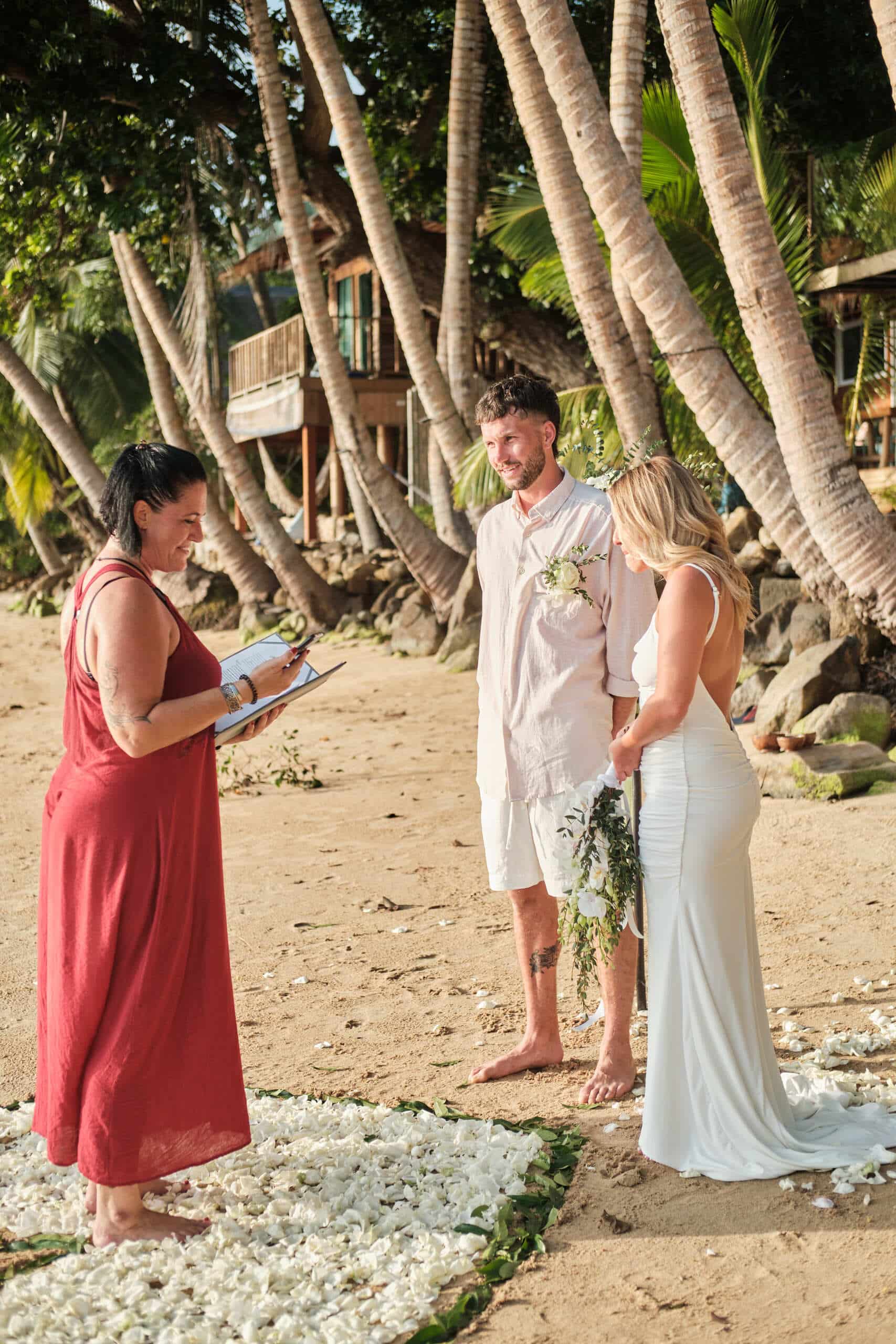beach wedding ceremony couple