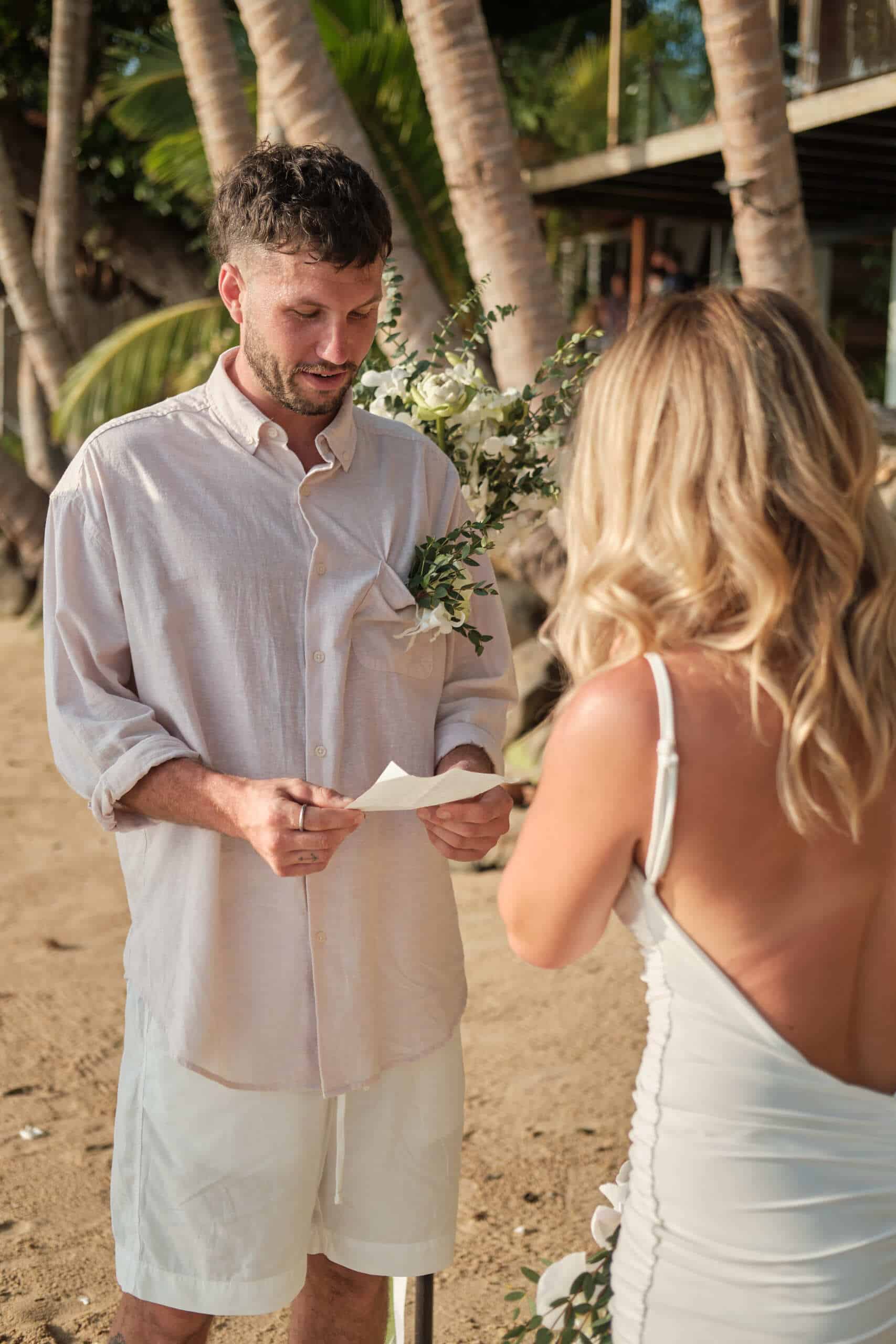 beach wedding ceremony groom