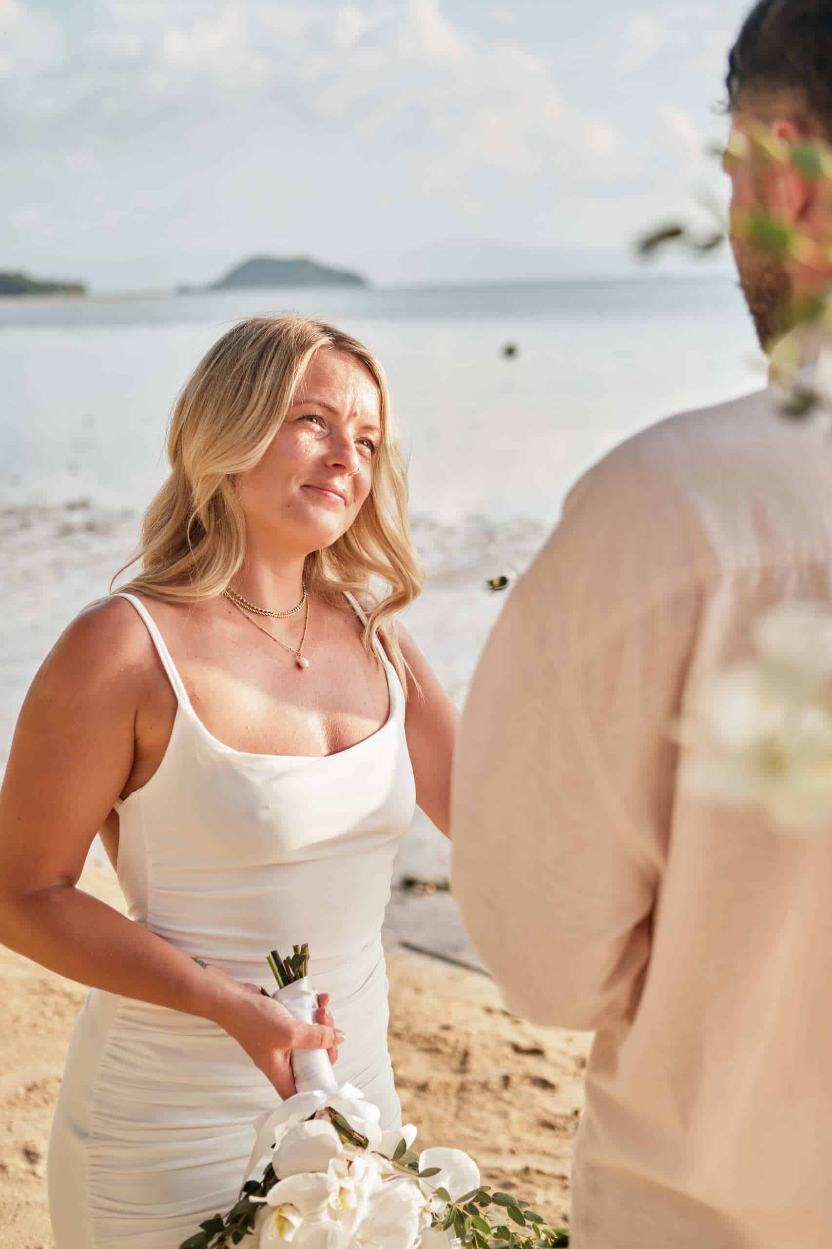 beach wedding ceremony bride