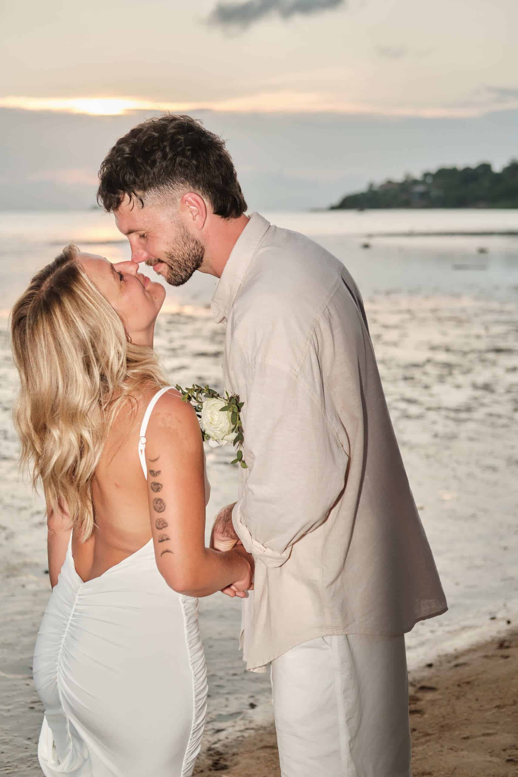 beach wedding couple sunset