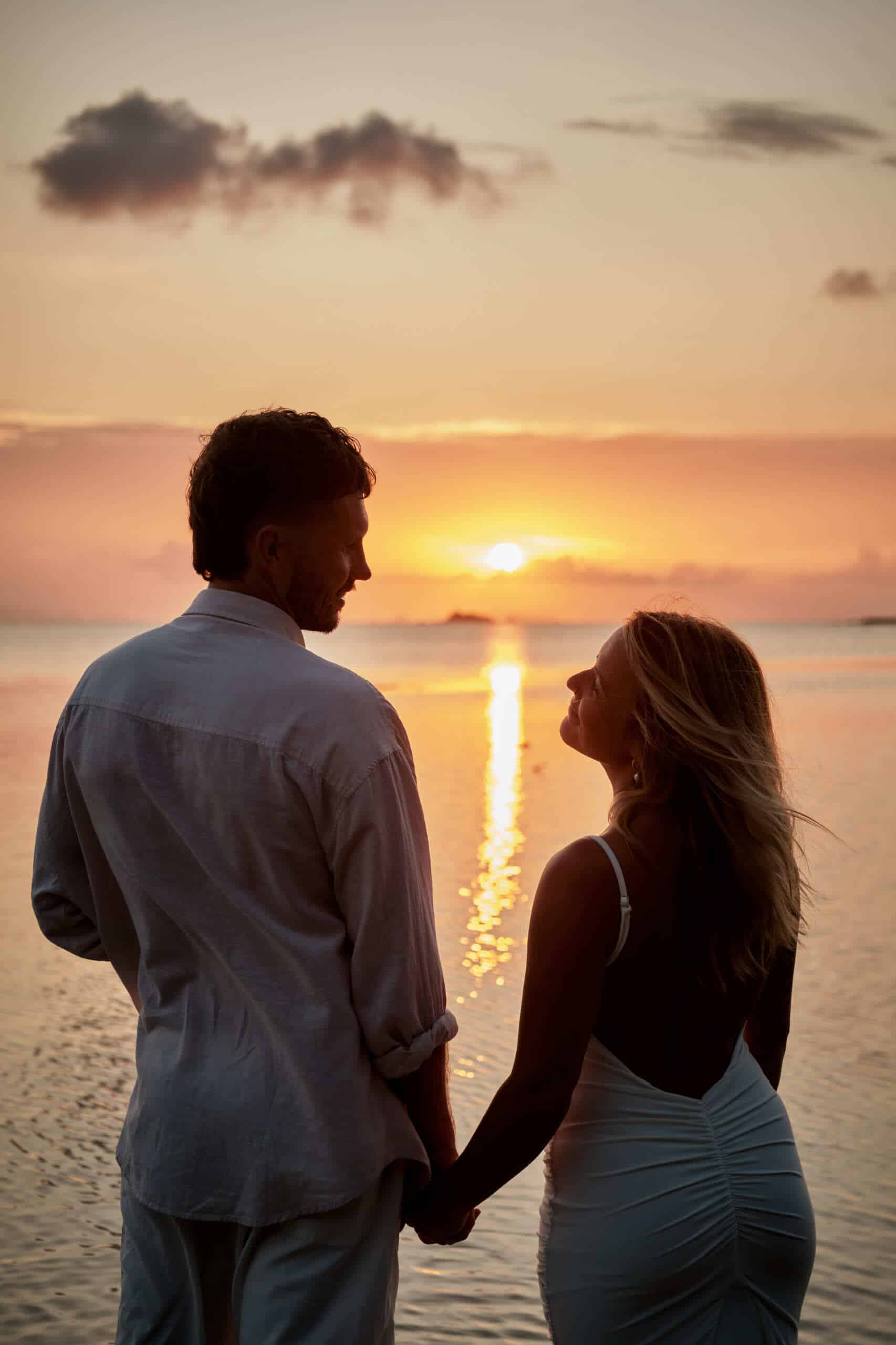 beach wedding couple sunset