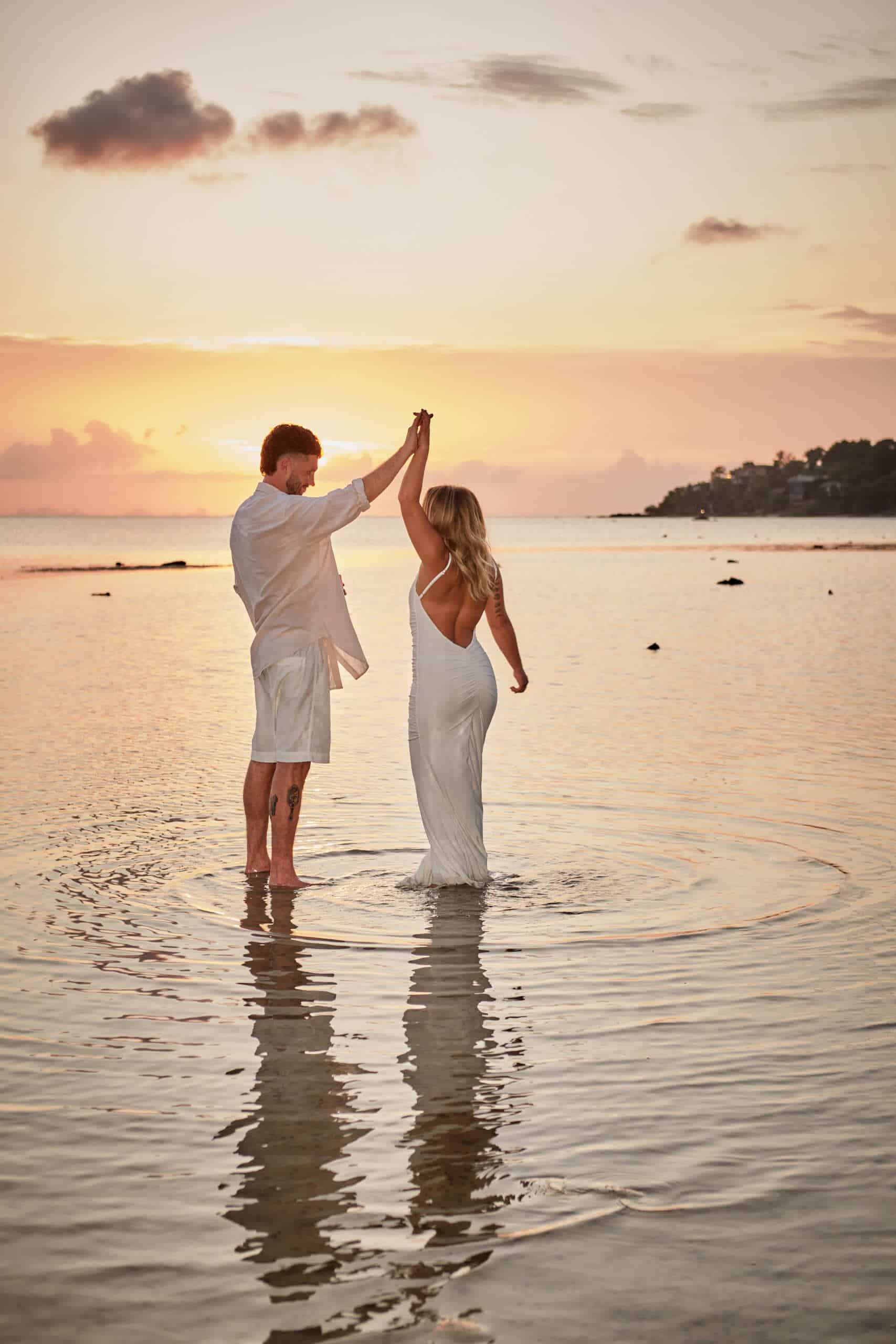 beach wedding couple sunset