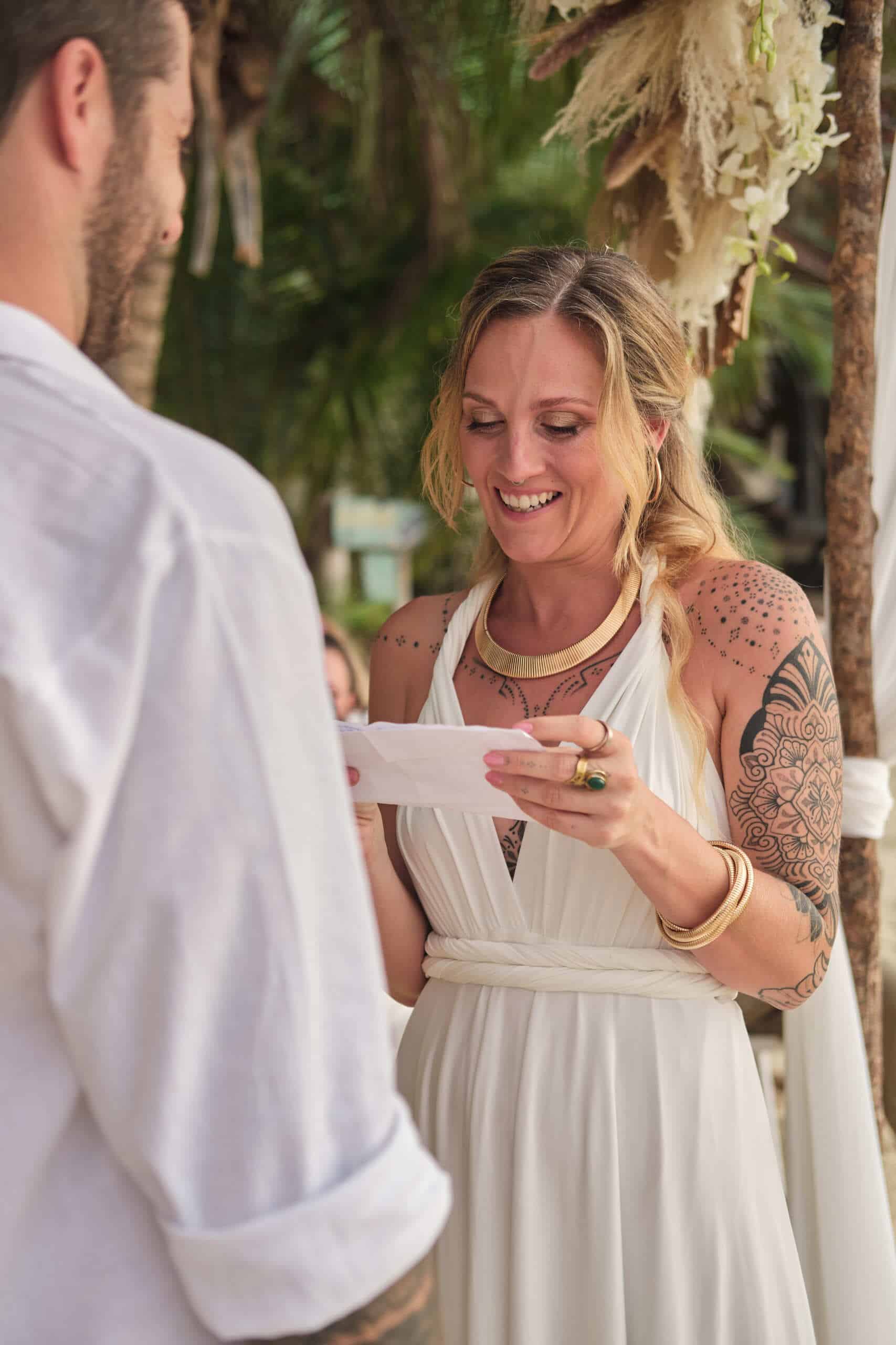 beach wedding ceremony bride