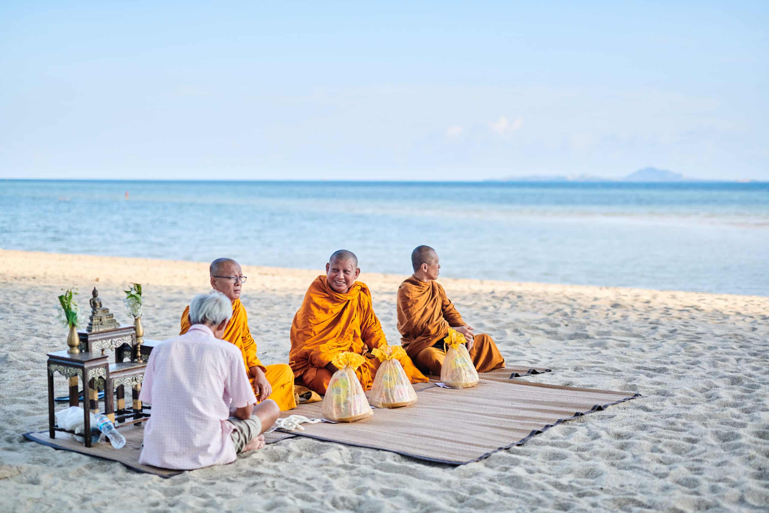 beach wedding monk blessing