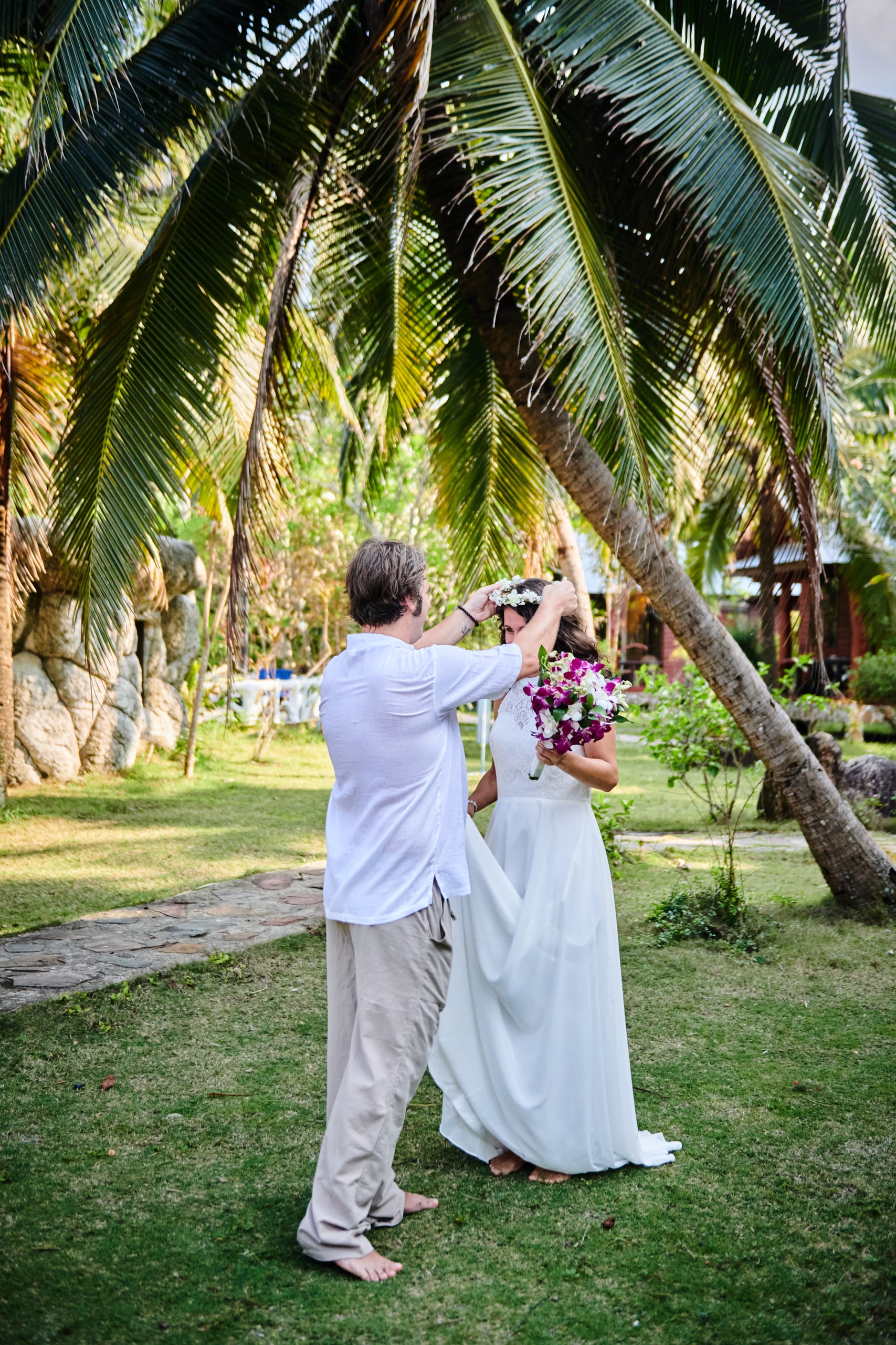 beach wedding couple getting ready