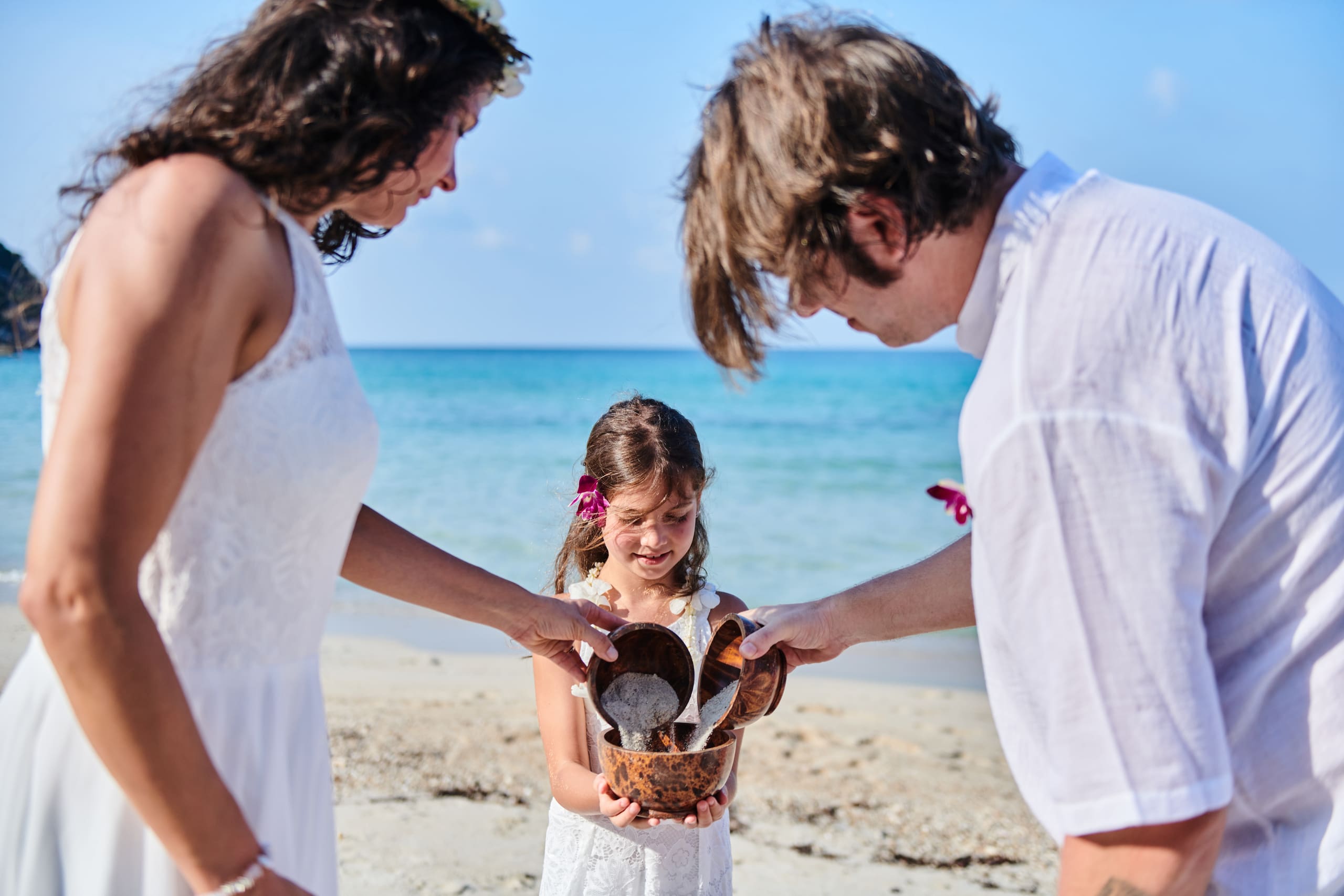 beach wedding ceremony family