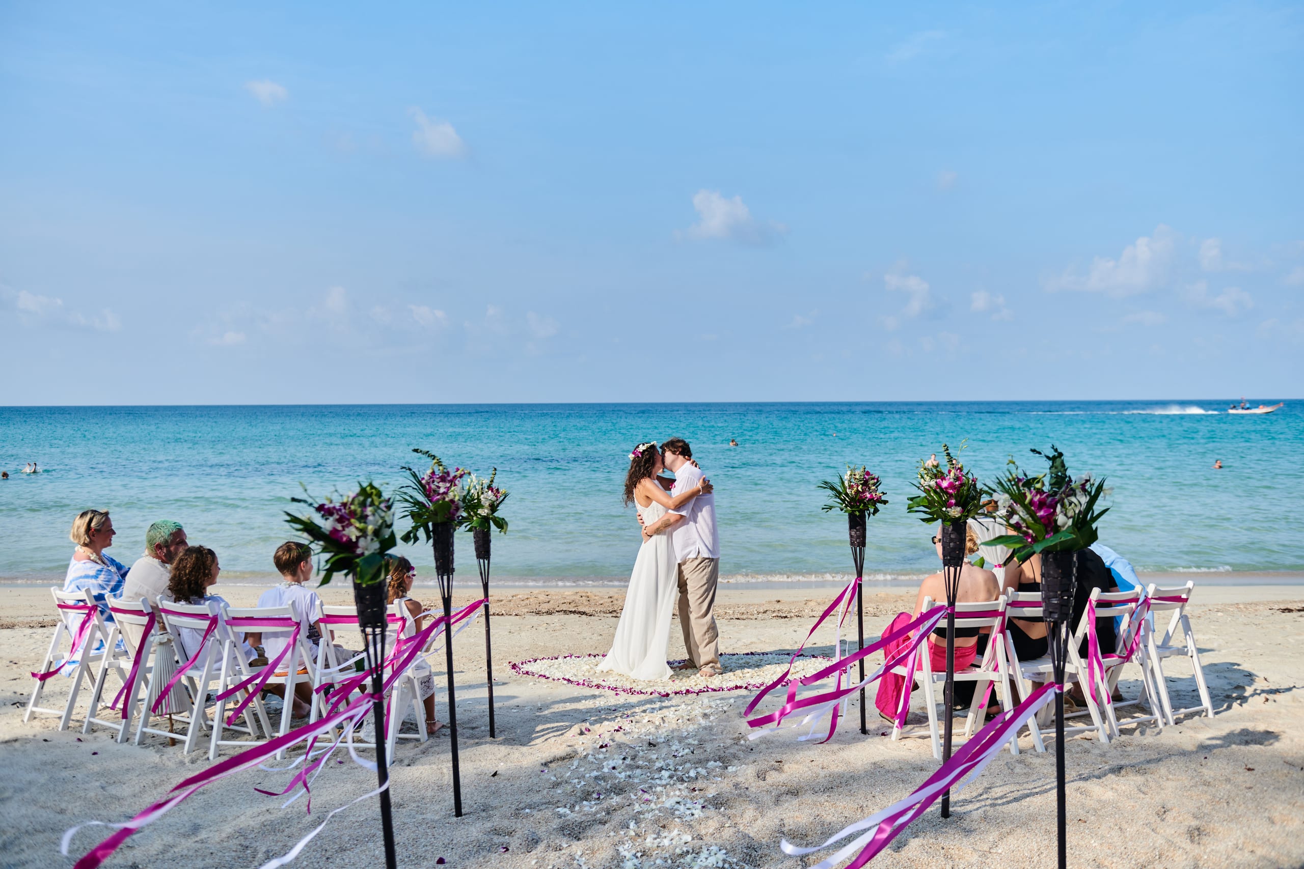 beach wedding couple kiss