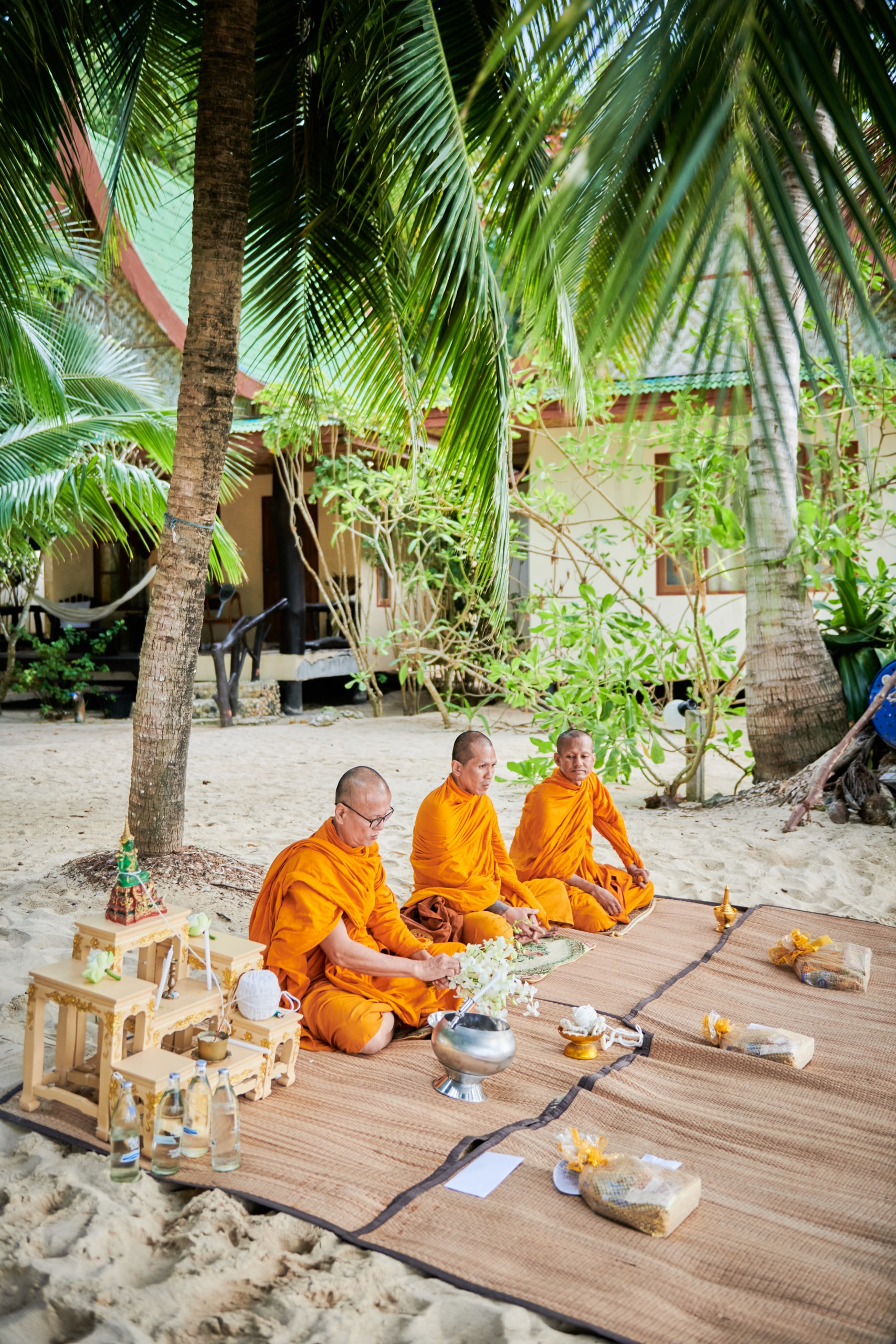 beach wedding ceremony monk blessing
