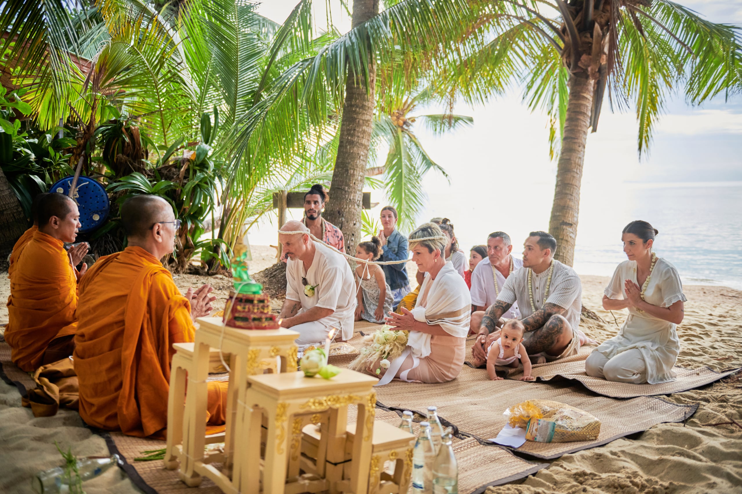 beach wedding ceremony monk blessing