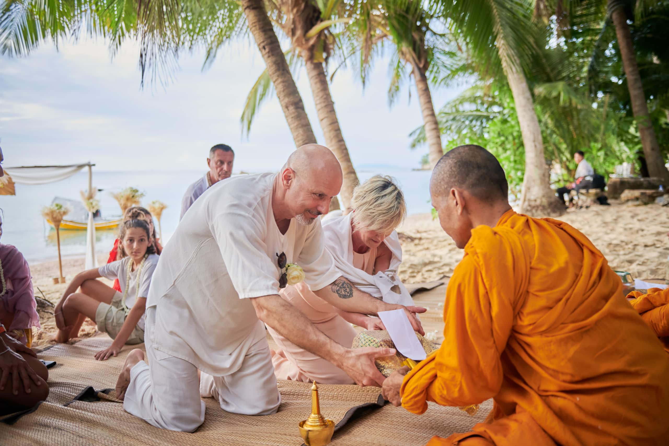 beach wedding monk blessing