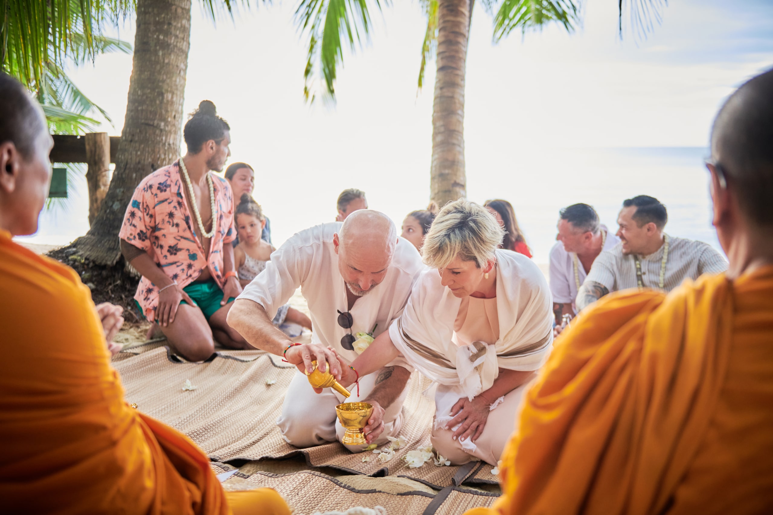 beach wedding ceremony monk blessing